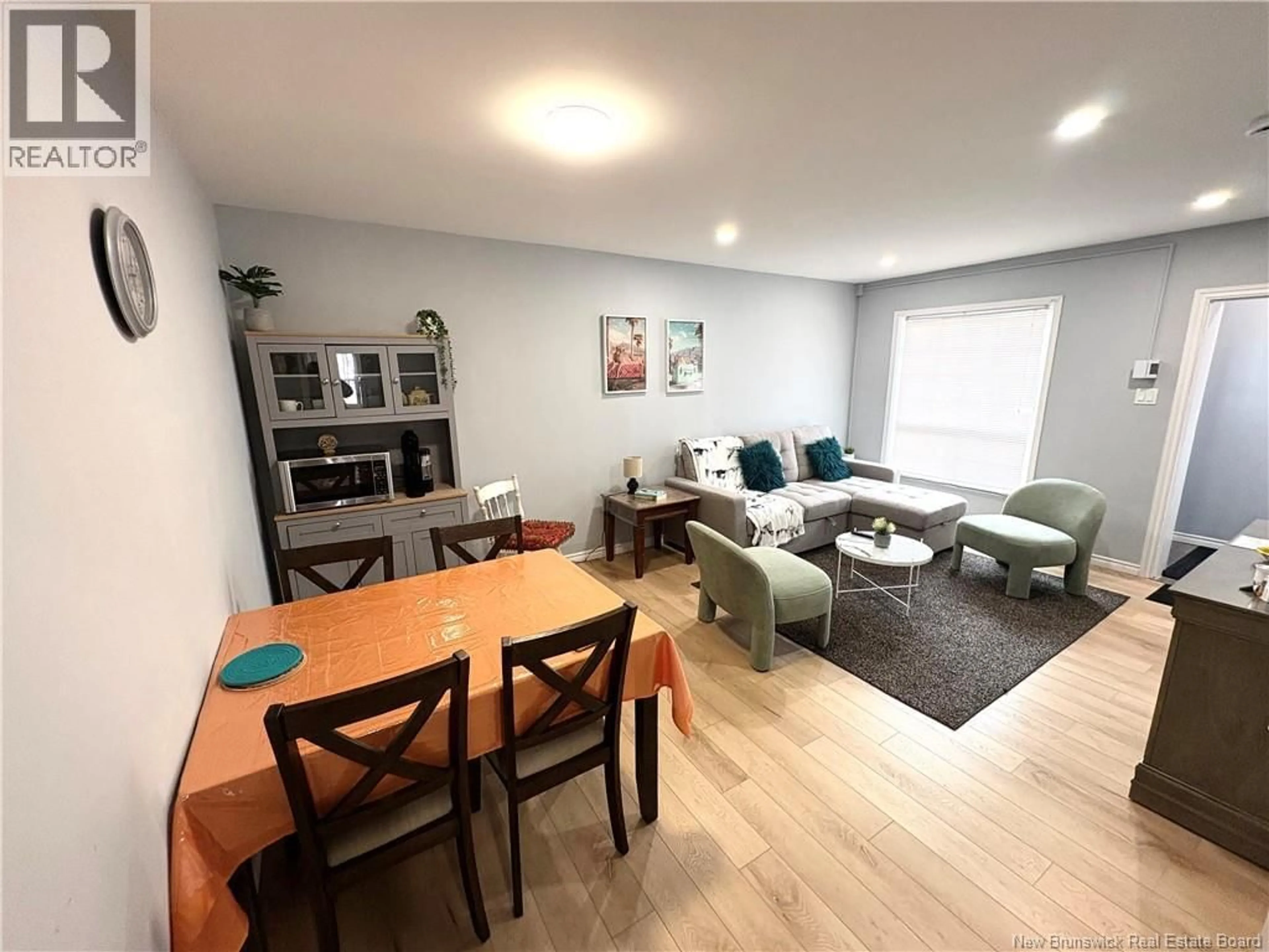 Living room with furniture, wood/laminate floor for 13-15 CORKERY STREET, Saint John New Brunswick E2K1Z5