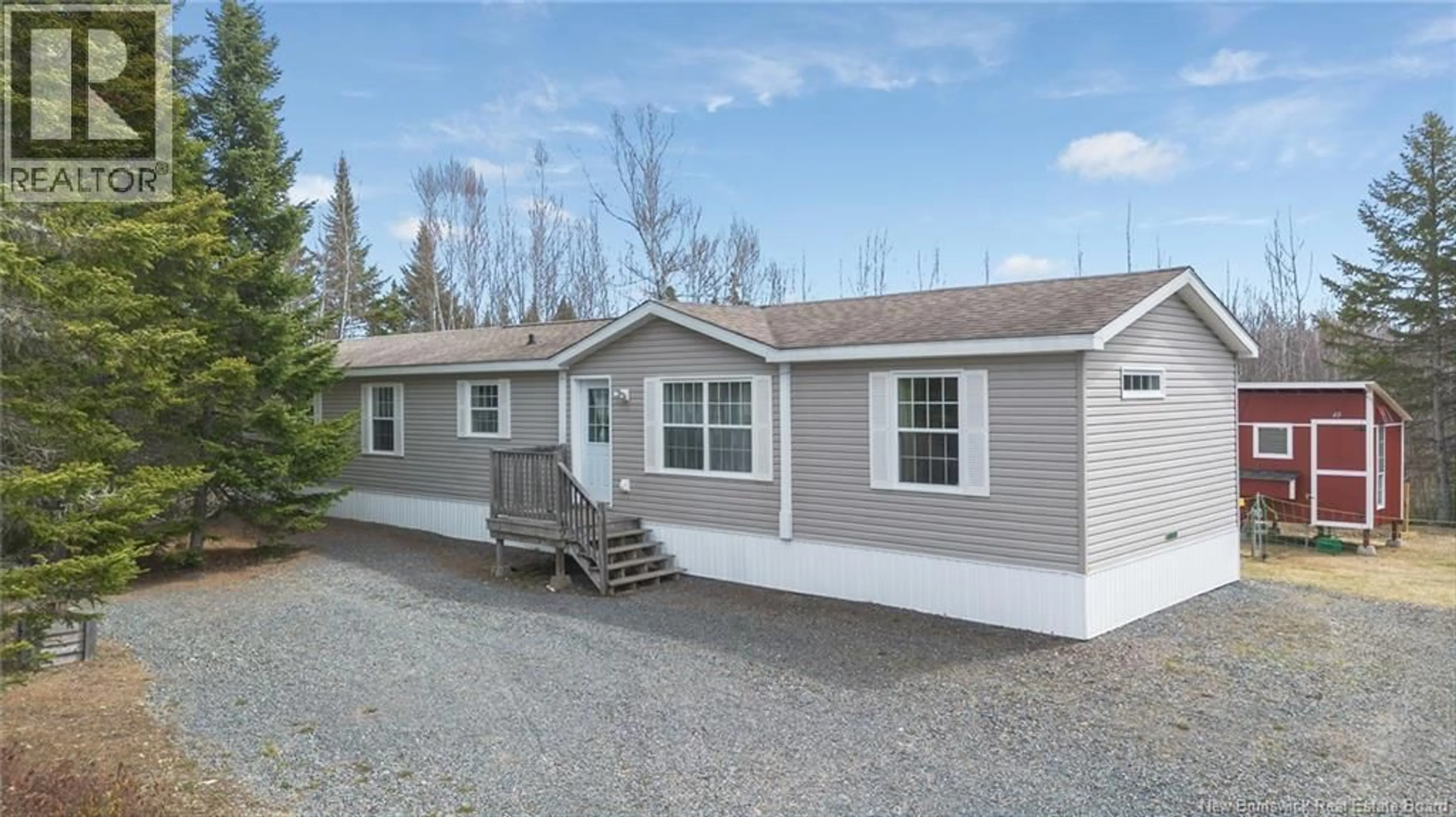 Home with vinyl exterior material, street for 40 LAWLER DRIVE, Rusagonis New Brunswick E3B0N5