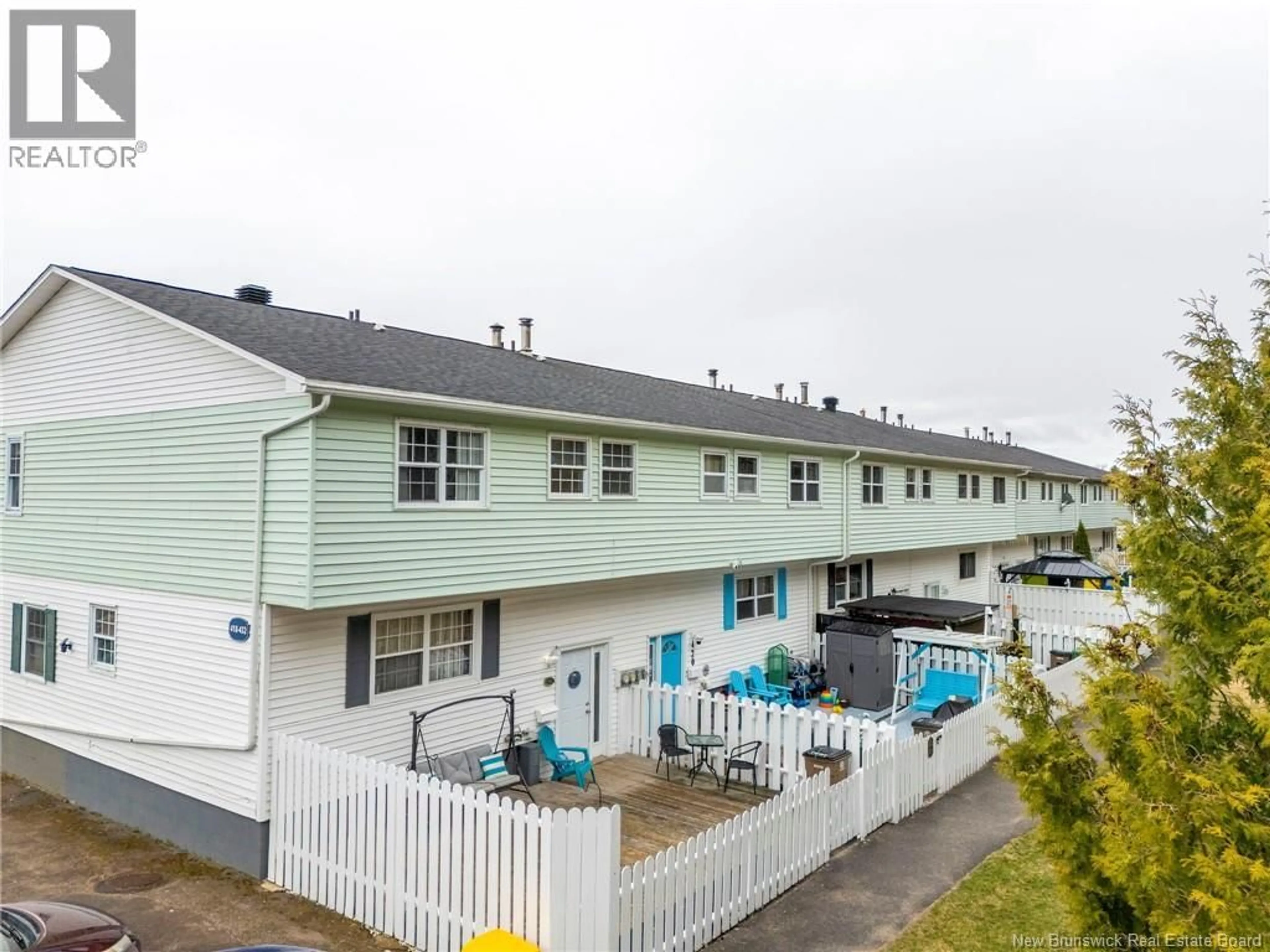 A pic from outside/outdoor area/front of a property/back of a property/a pic from drone, street for 418 TARTAN STREET, Saint John New Brunswick E2K2R7