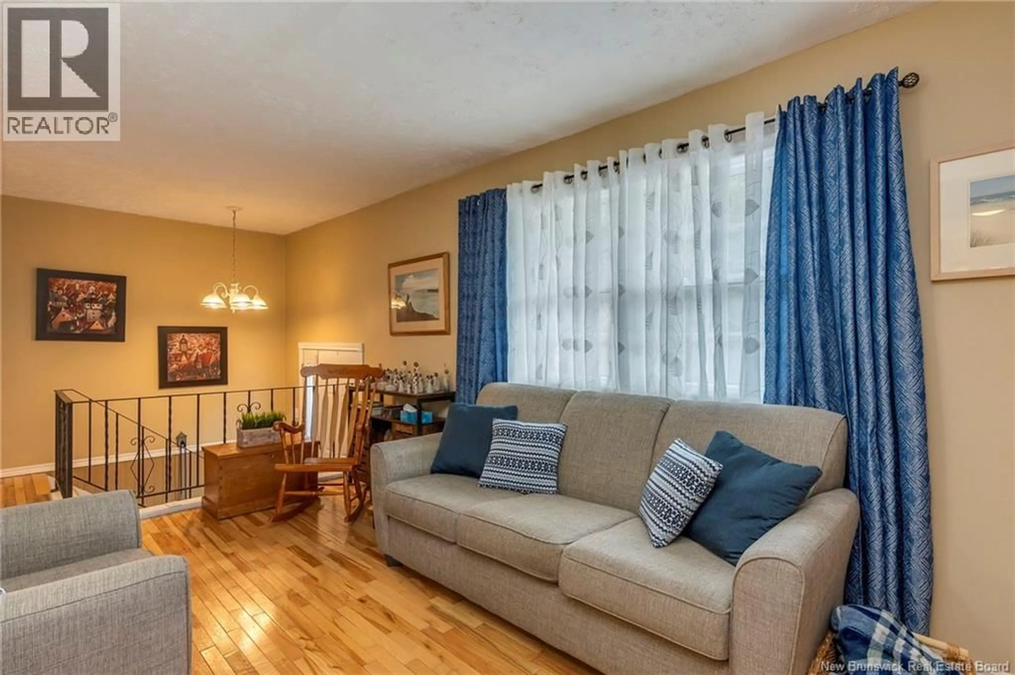 Living room with furniture, wood/laminate floor for 418 TARTAN STREET, Saint John New Brunswick E2K2R7