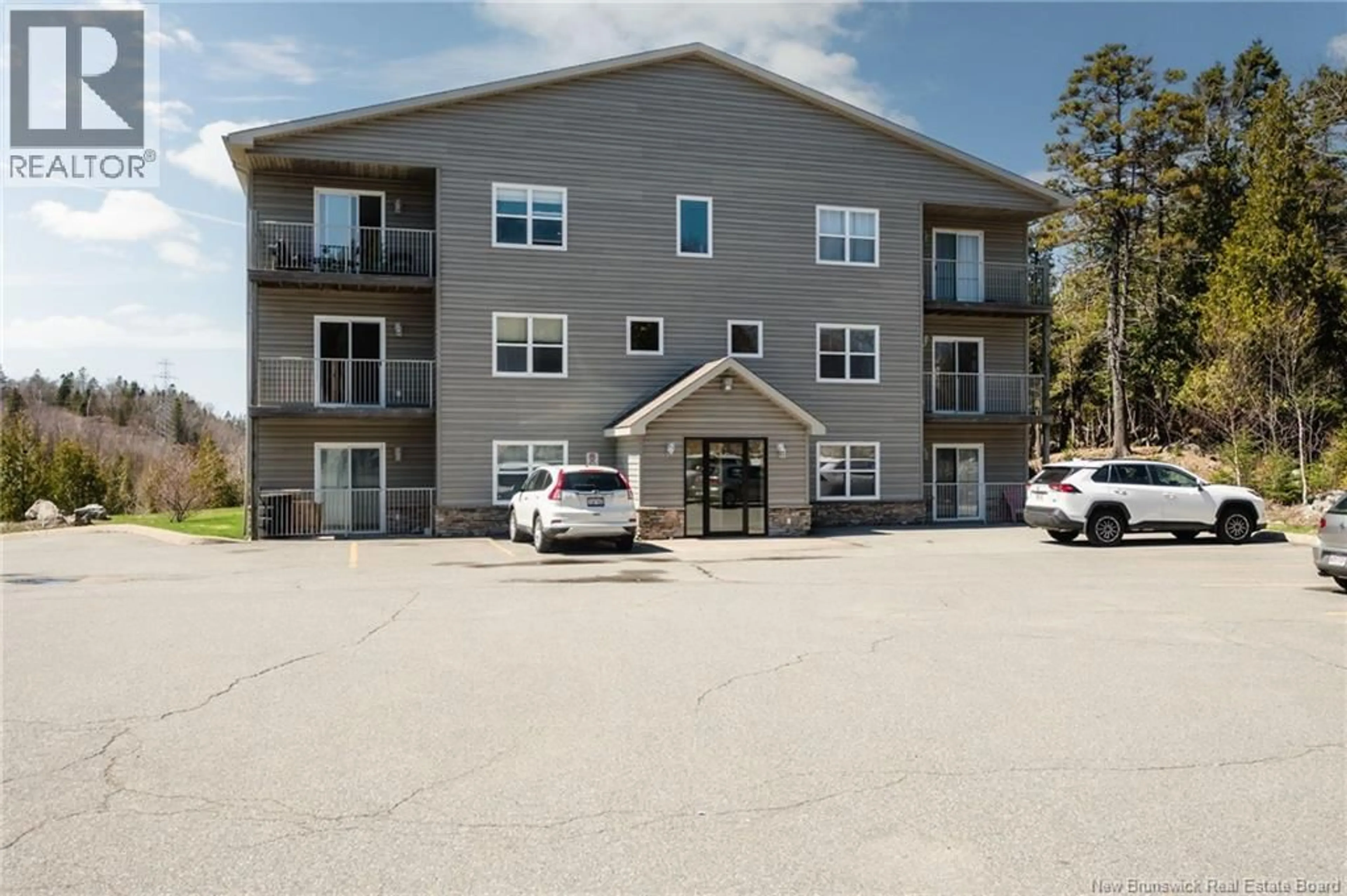 A pic from outside/outdoor area/front of a property/back of a property/a pic from drone, building for 11 - 1200 SOMERSET STREET, Saint John New Brunswick E2K0E2