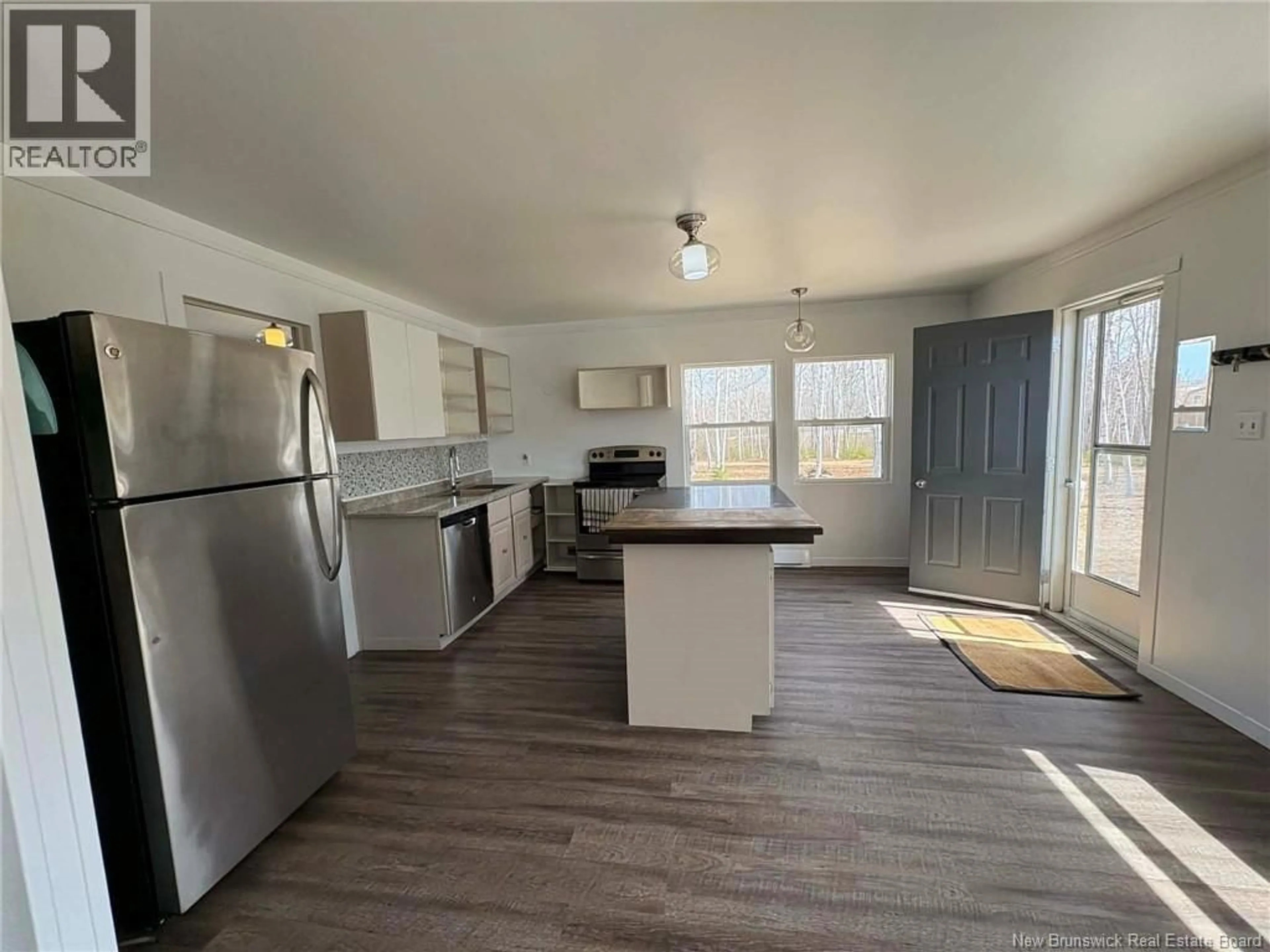Open concept kitchen, wood/laminate floor for 1873 ROUTE 530 ROUTE, Grande-Digue New Brunswick E4R5E7
