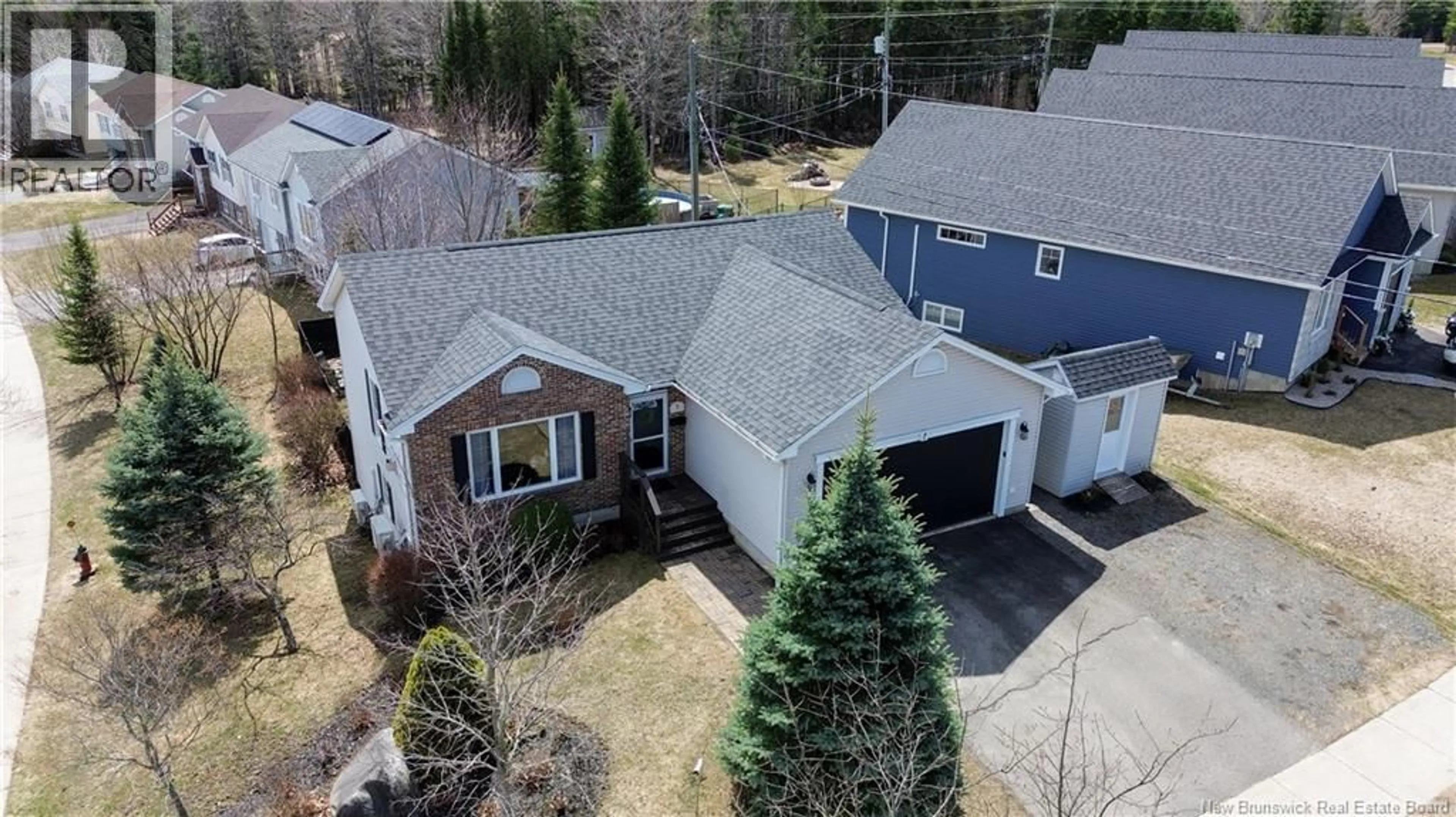 A pic from outside/outdoor area/front of a property/back of a property/a pic from drone, street for 7 WYNGATE DRIVE, Fredericton New Brunswick E3A9X8