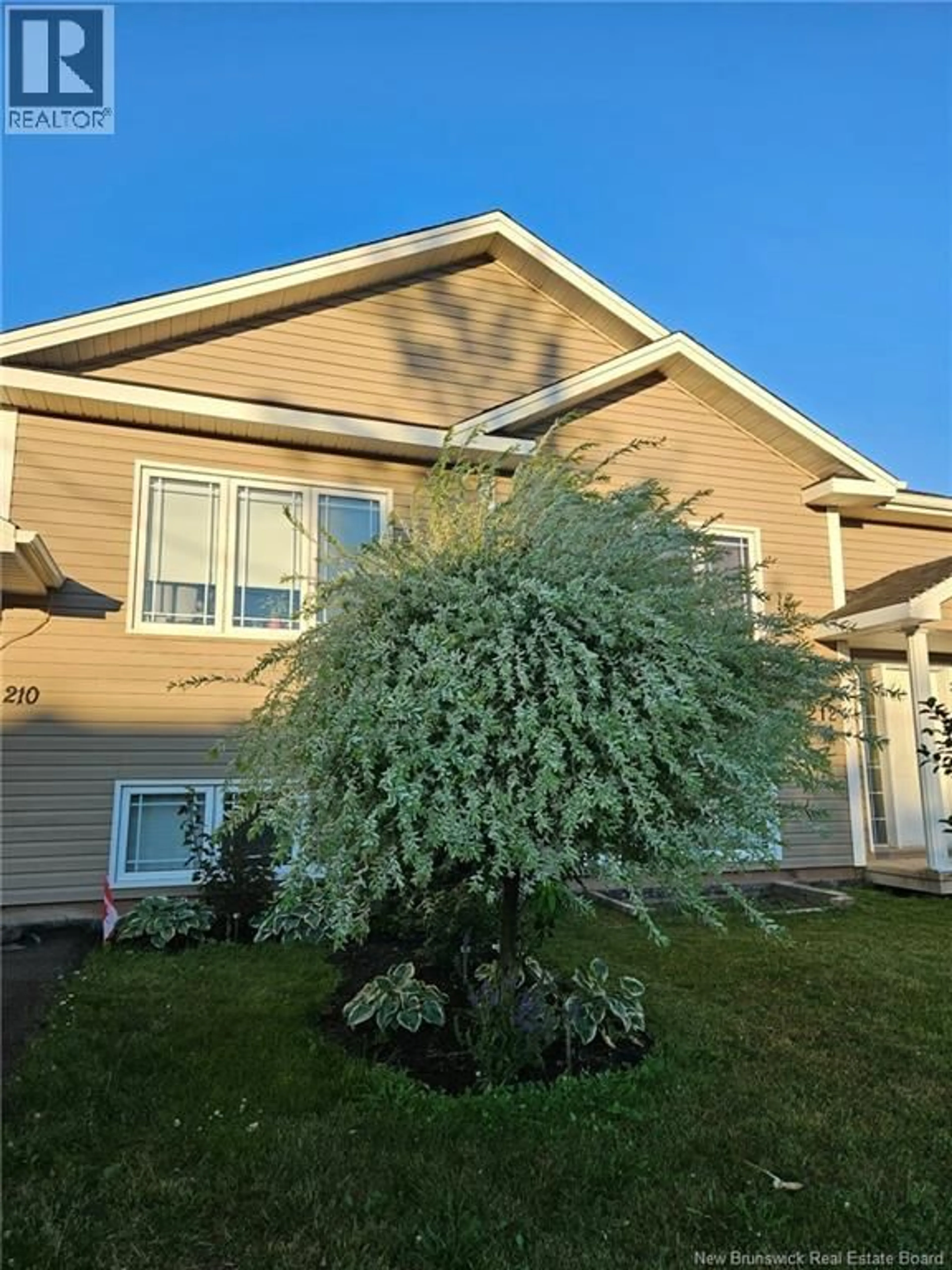 Home with vinyl exterior material, street for 210 LORETTE, Dieppe New Brunswick E1A0E2