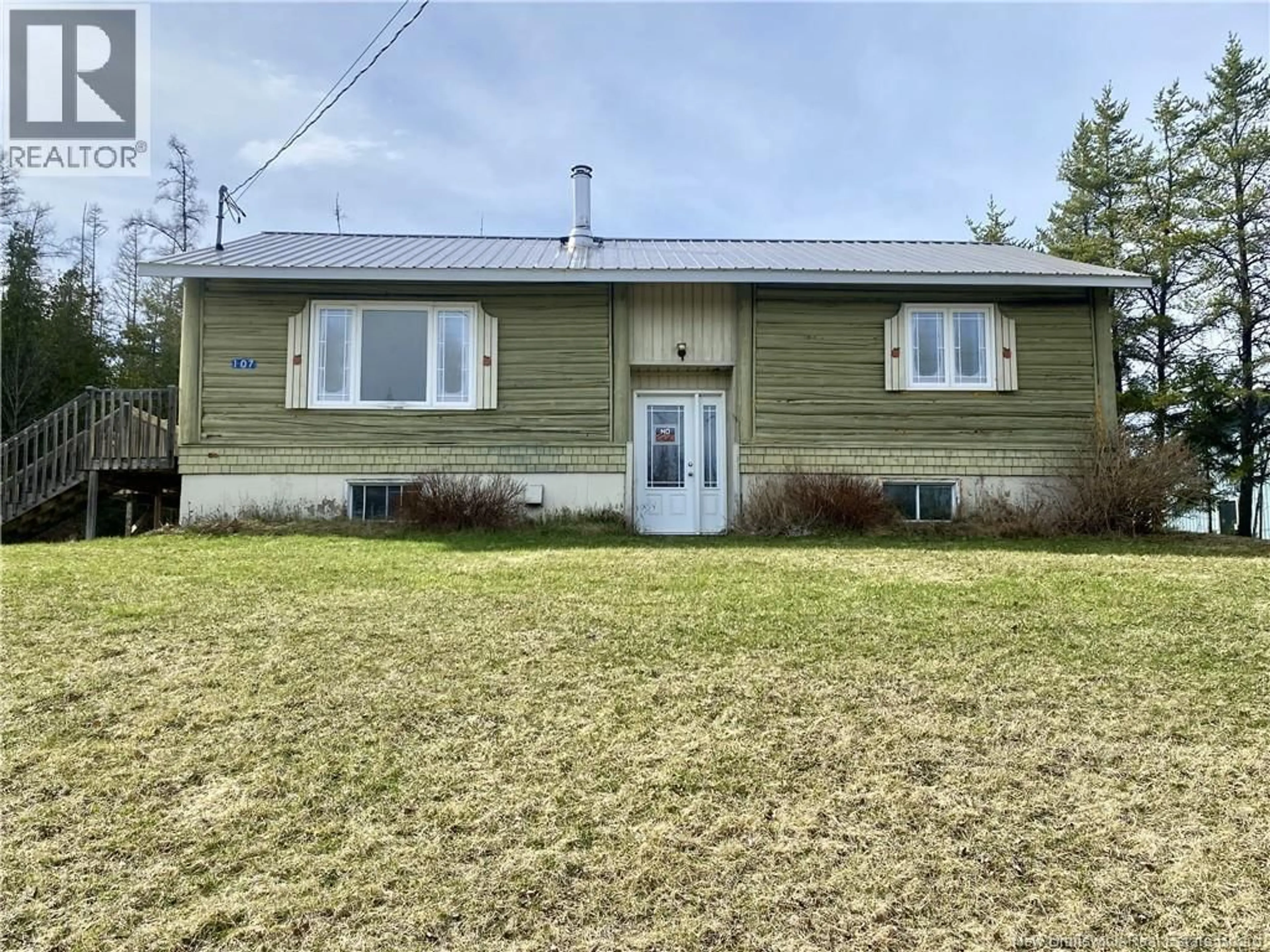 Home with vinyl exterior material, street for 107 ROUTE 385, Weaver New Brunswick E7G3N1