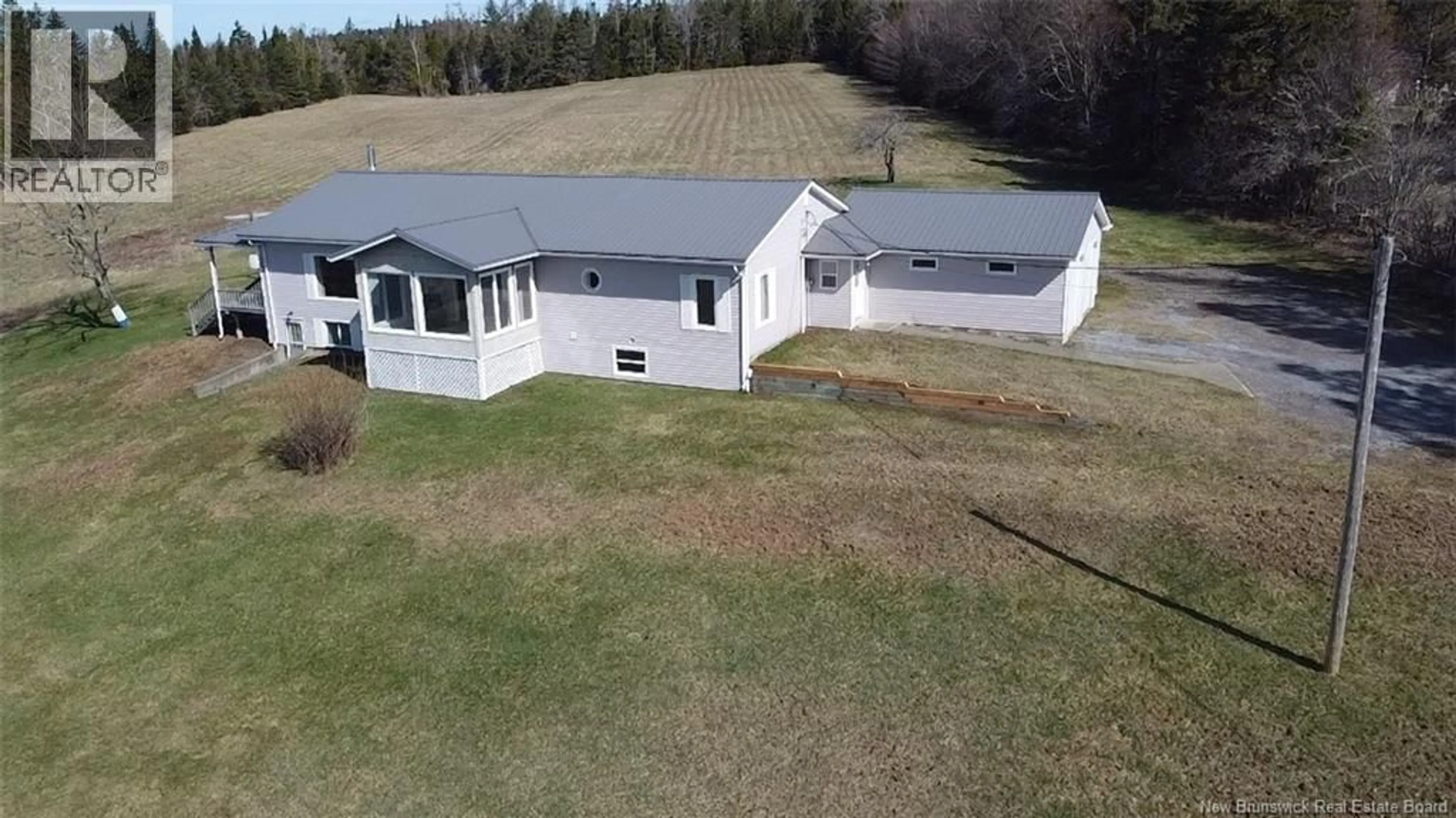 A pic from outside/outdoor area/front of a property/back of a property/a pic from drone, building for 89 GLEBE ROAD, Chamcook New Brunswick E5B3B7