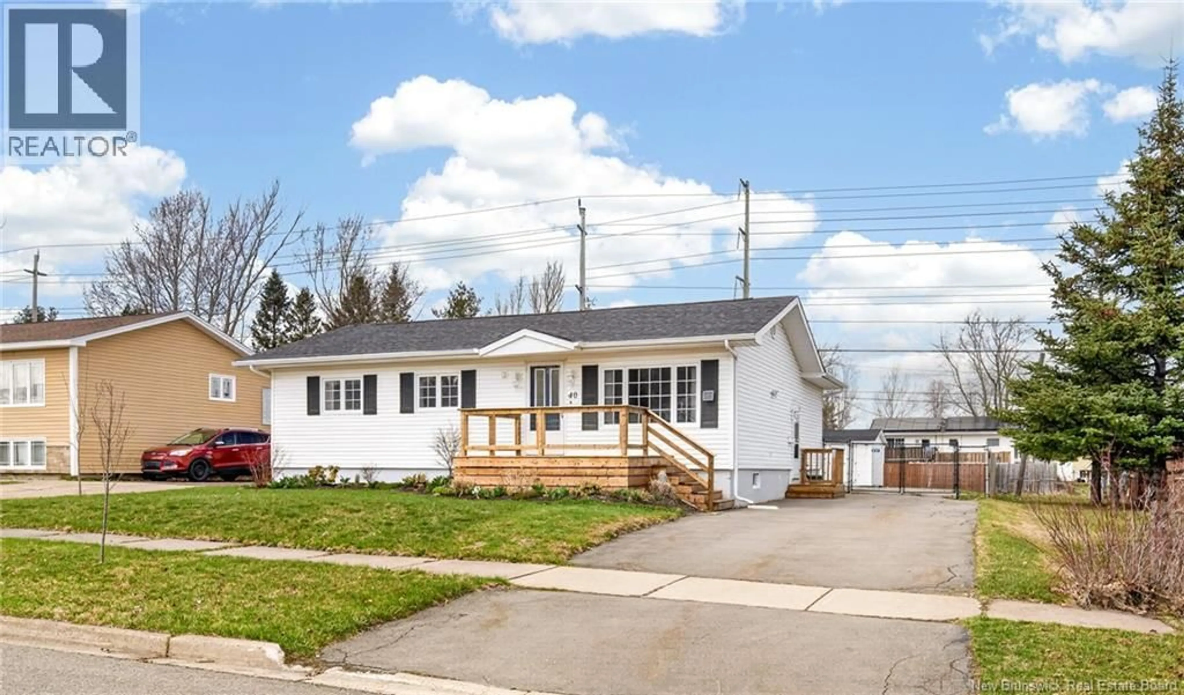 Home with vinyl exterior material, street for 40 KNOX DRIVE, Moncton New Brunswick E1G1L8