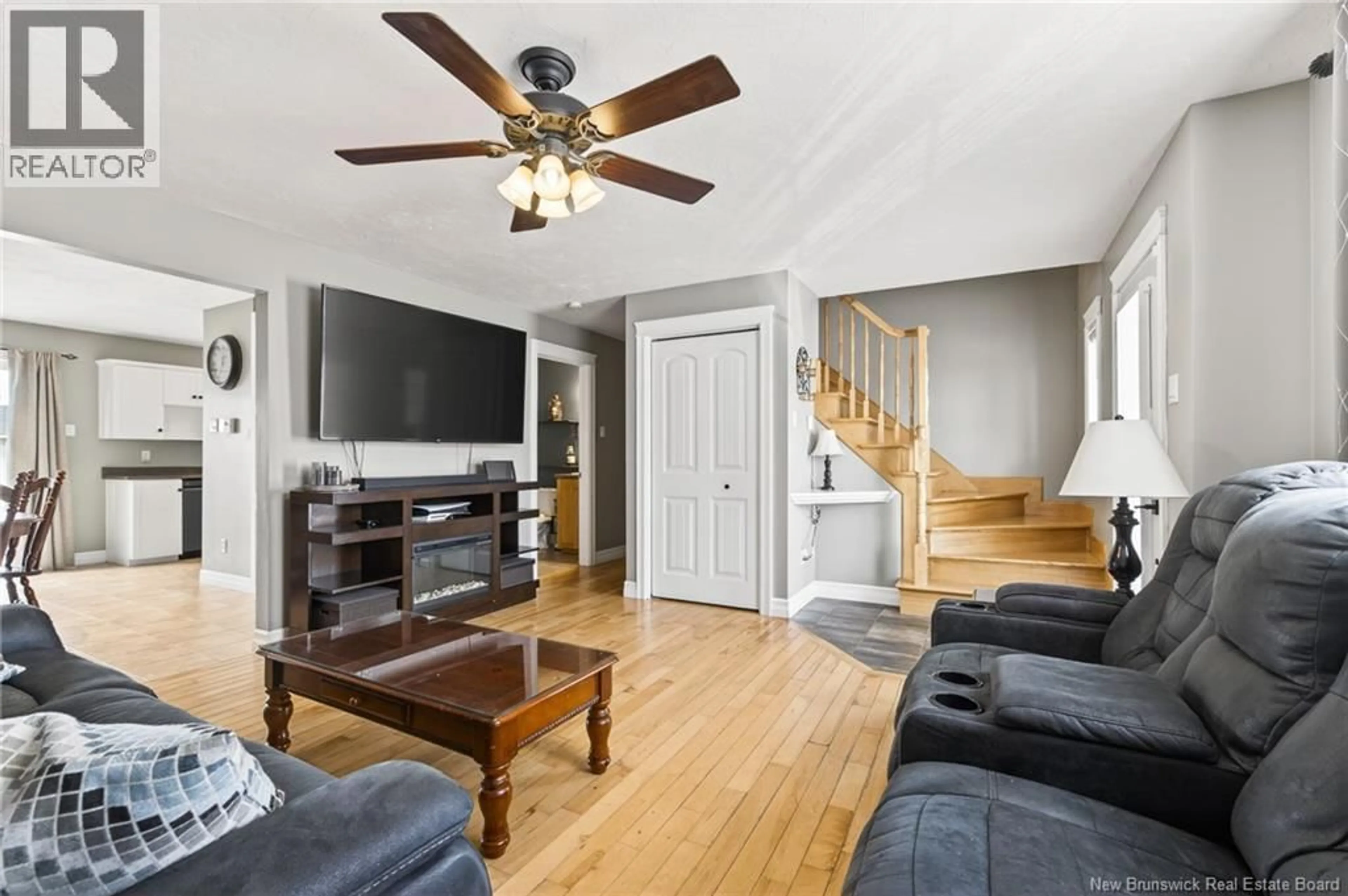 Living room with furniture, wood/laminate floor for 179 JORDAN CRESCENT, Moncton New Brunswick E1C0S5