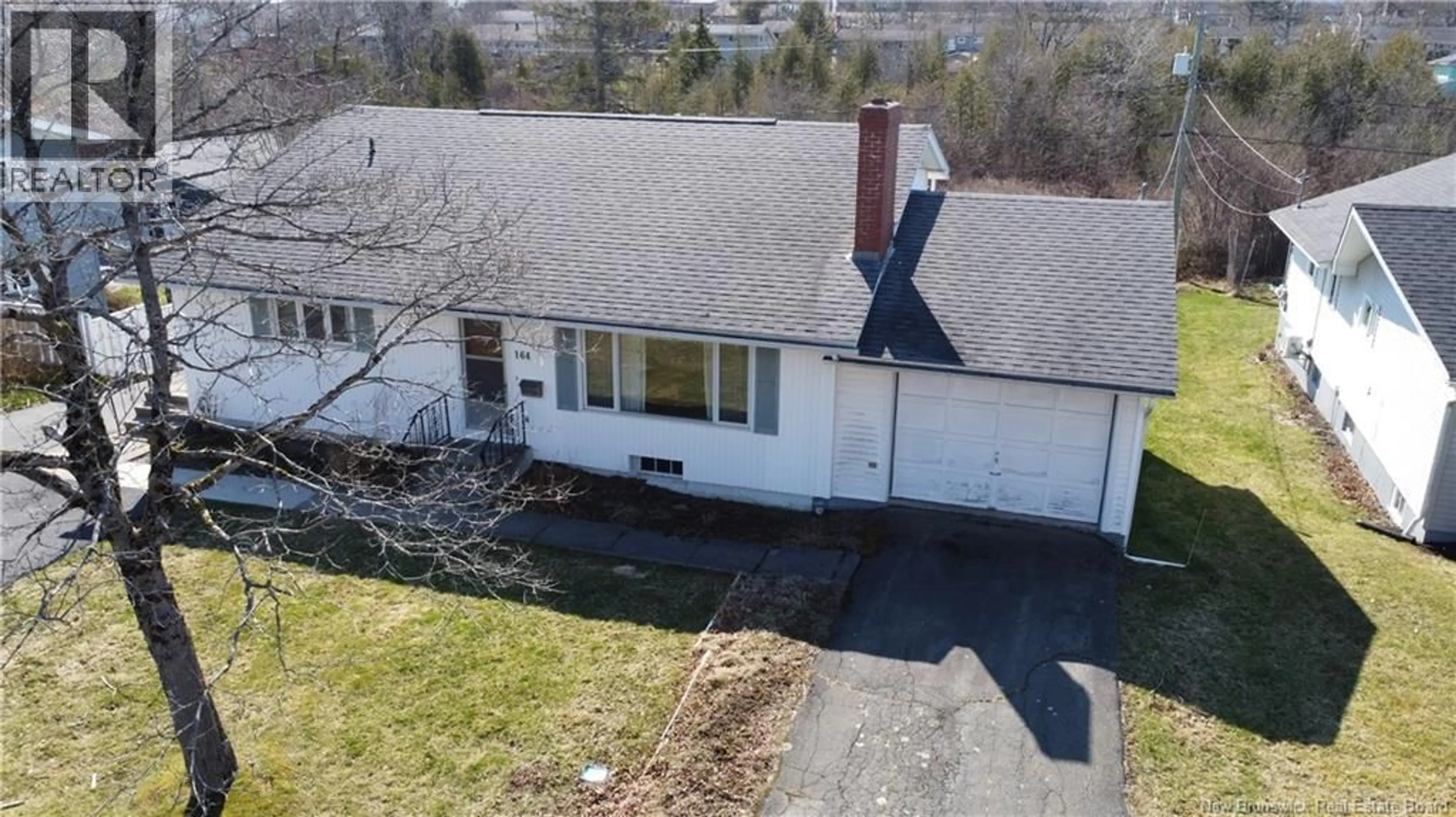 A pic from outside/outdoor area/front of a property/back of a property/a pic from drone, street for 164 GREENDALE CRESCENT, Saint John New Brunswick E2M4L6