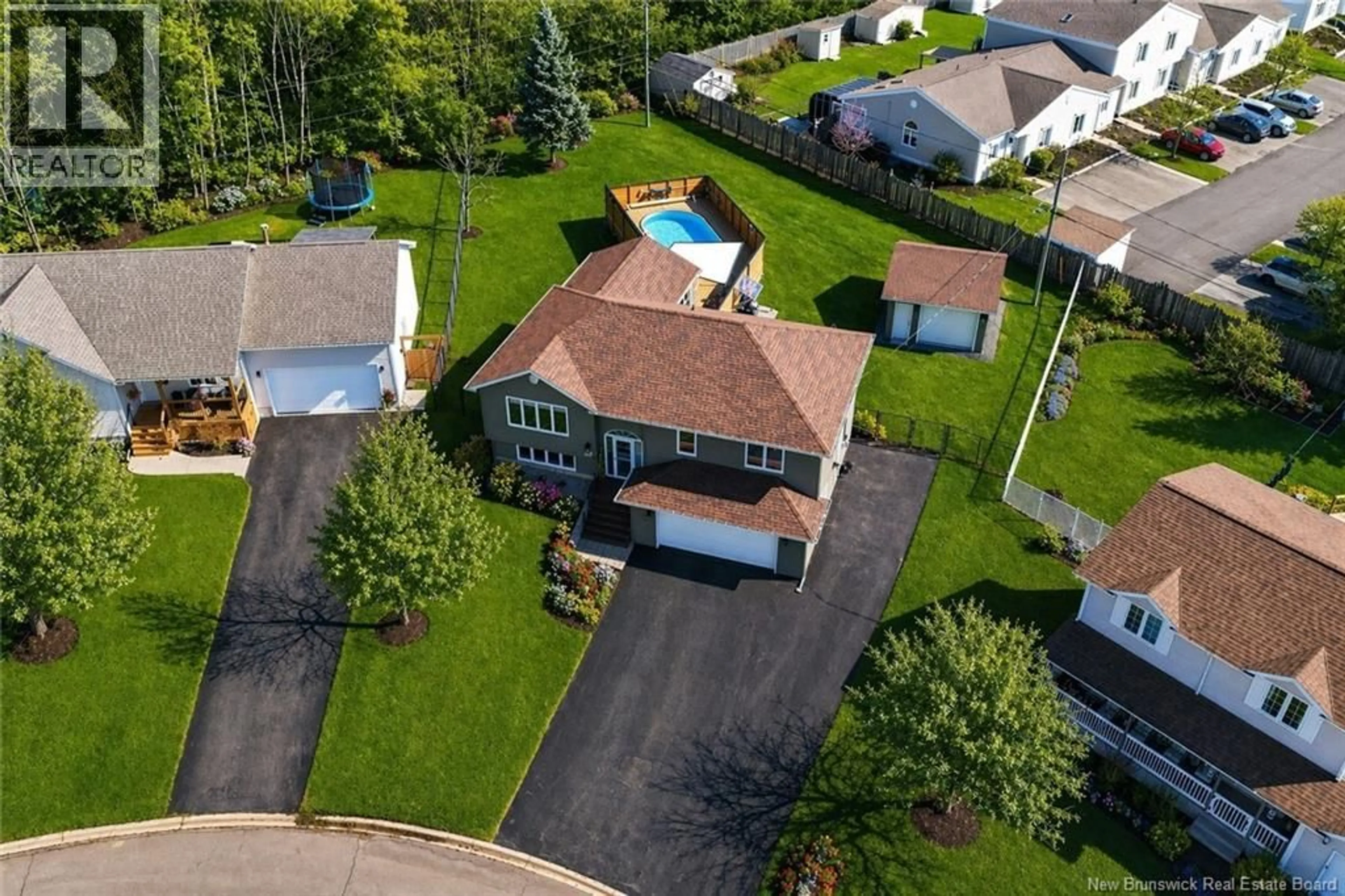 A pic from outside/outdoor area/front of a property/back of a property/a pic from drone, street for 59 OLD OAK, Moncton New Brunswick E1A6W2