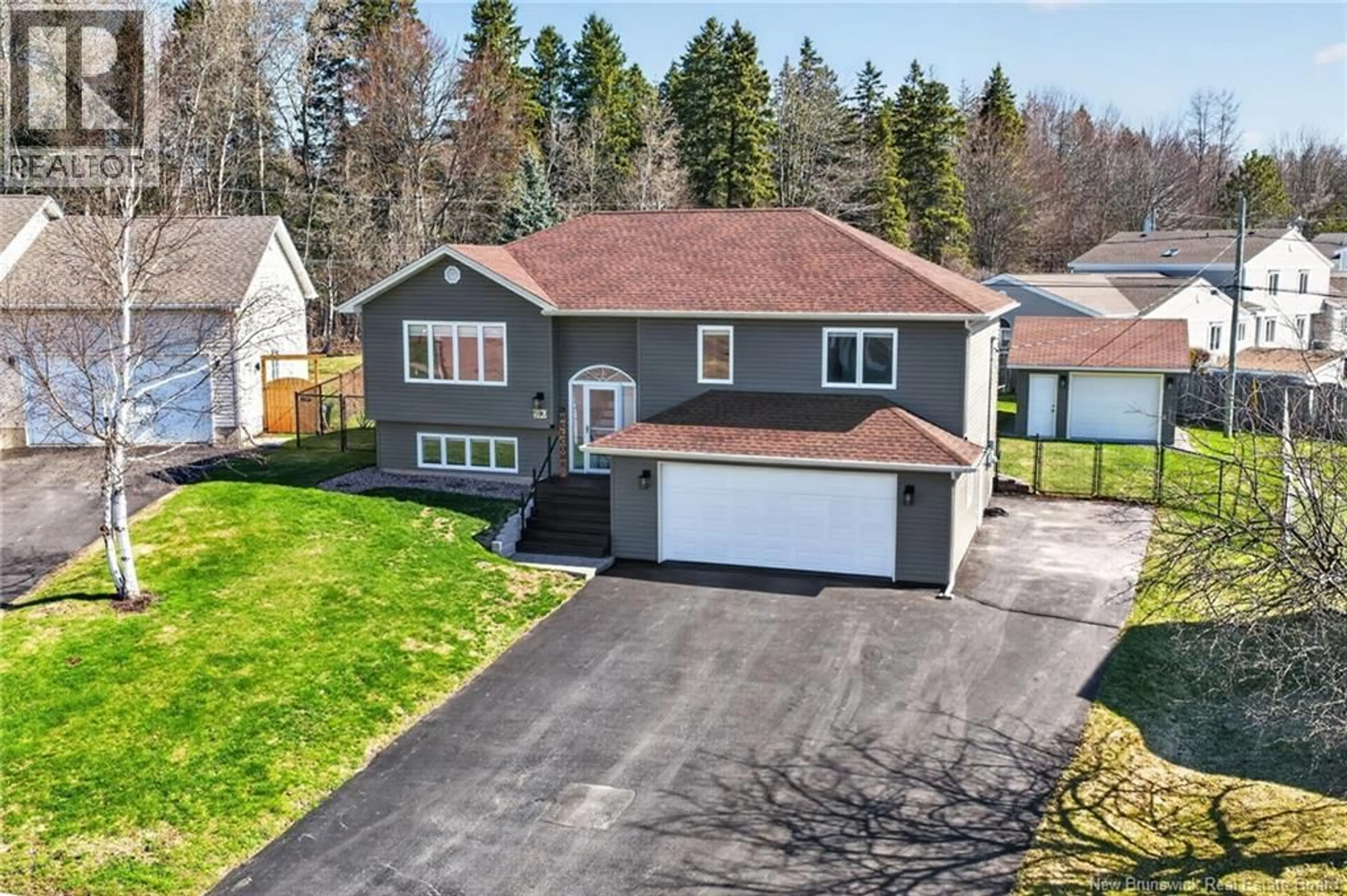 A pic from outside/outdoor area/front of a property/back of a property/a pic from drone, street for 59 OLD OAK, Moncton New Brunswick E1A6W2