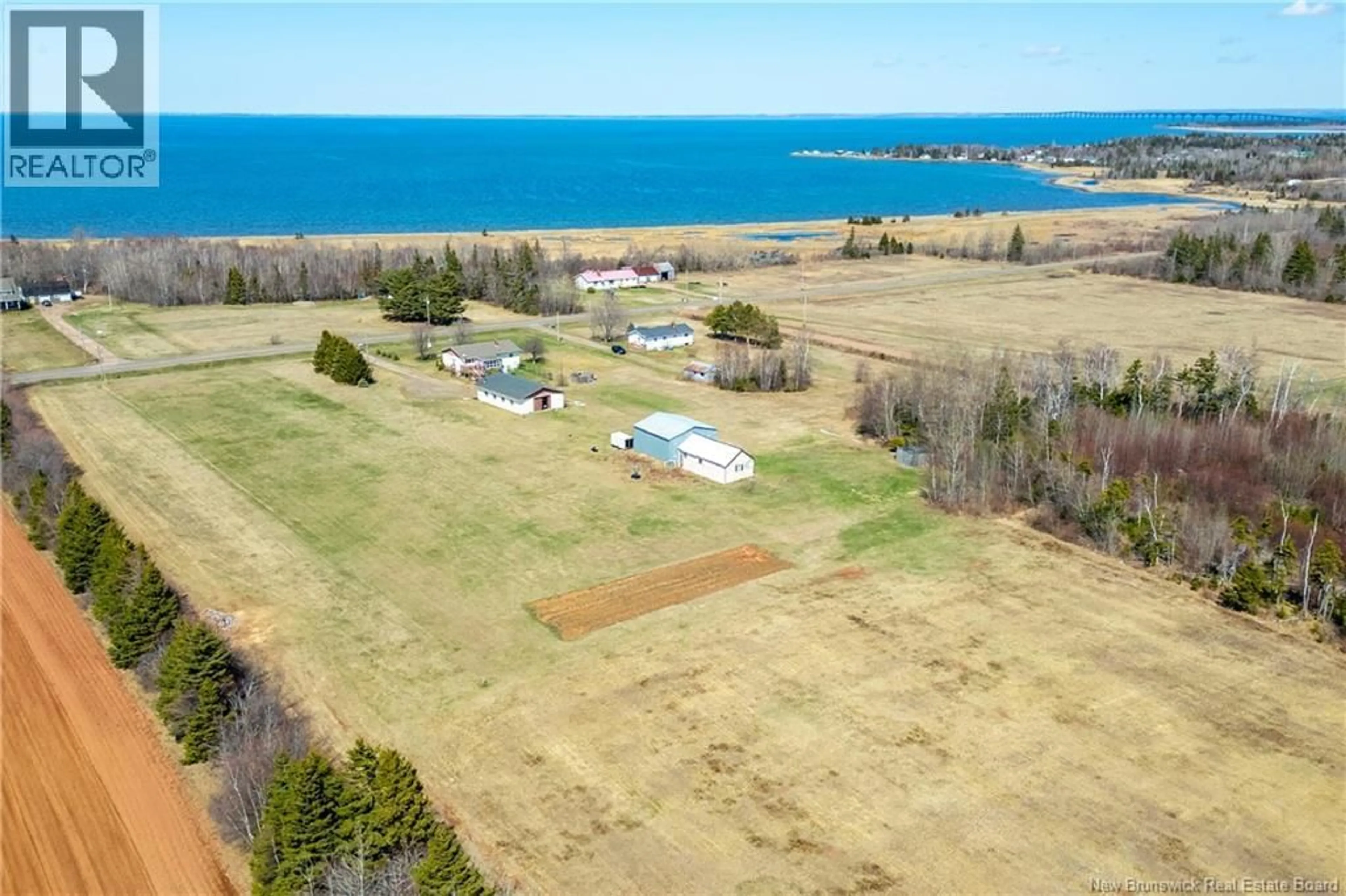 A pic from outside/outdoor area/front of a property/back of a property/a pic from drone, water/lake/river/ocean view for 750 ROUTE 955, Murray Corner New Brunswick E4M3K8