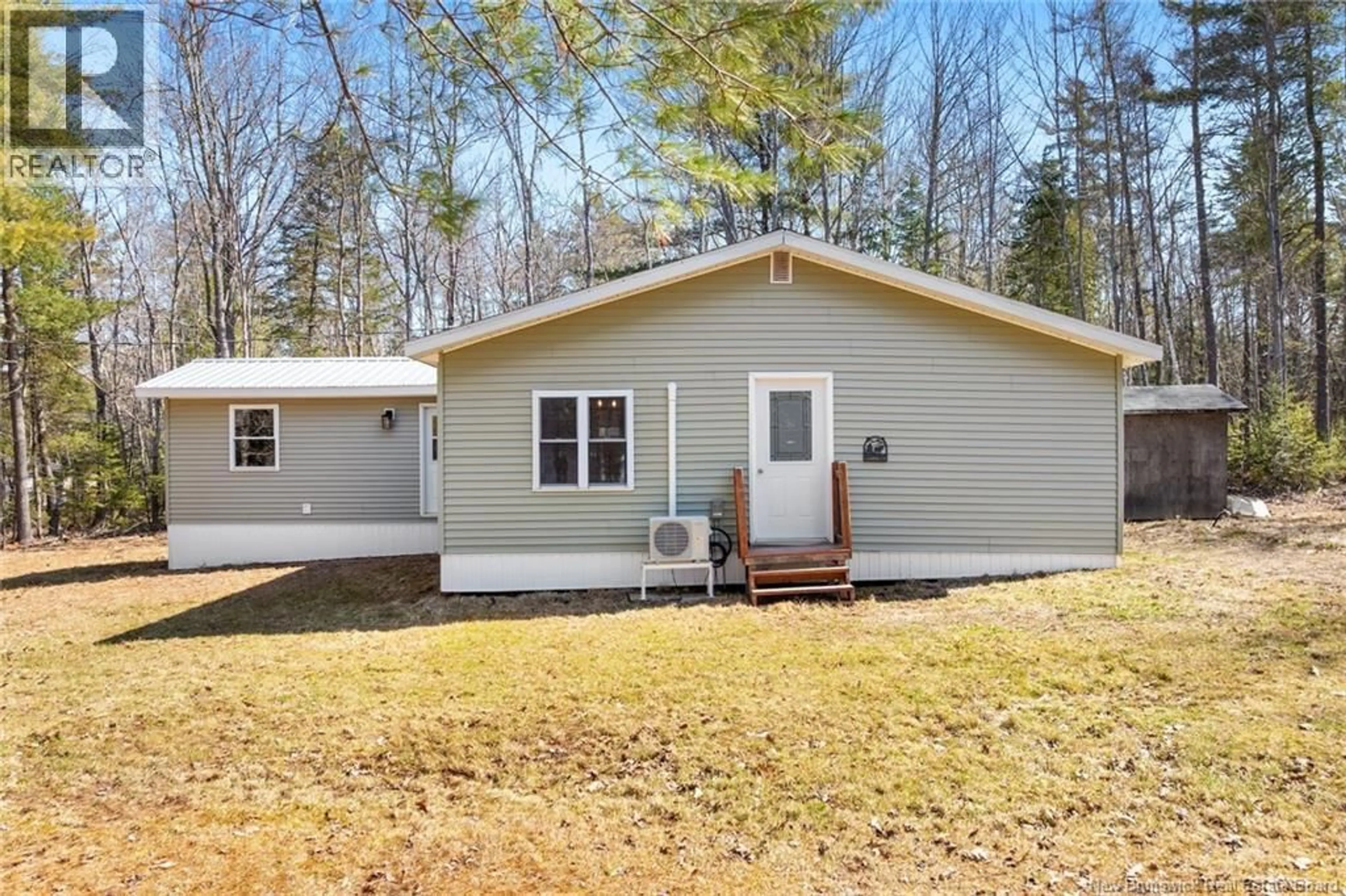 Home with vinyl exterior material, street for 42 GORDON SHORE ROAD, Whites Cove New Brunswick E4C3A7