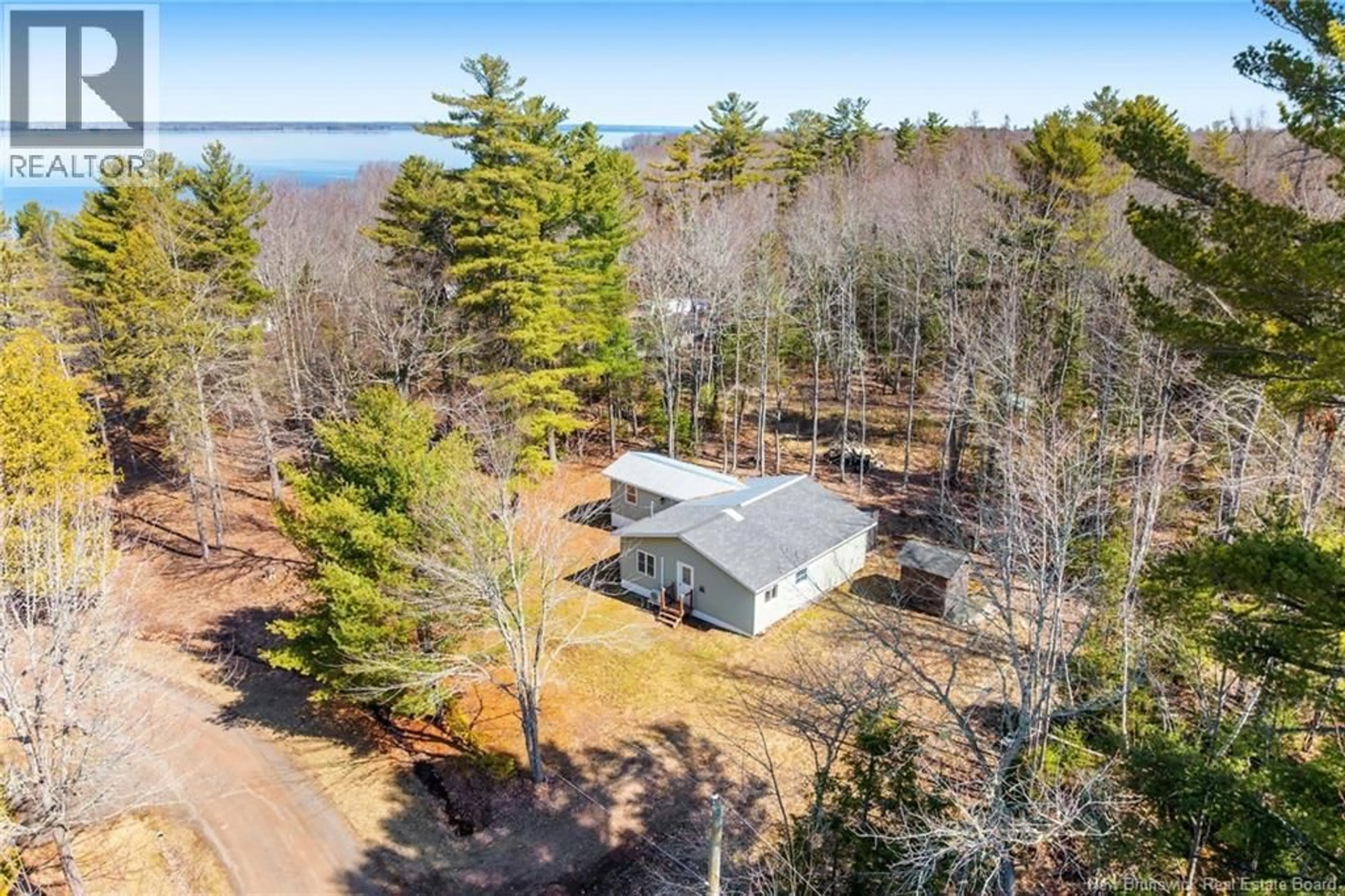 A pic from outside/outdoor area/front of a property/back of a property/a pic from drone, water/lake/river/ocean view for 42 GORDON SHORE ROAD, Whites Cove New Brunswick E4C3A7