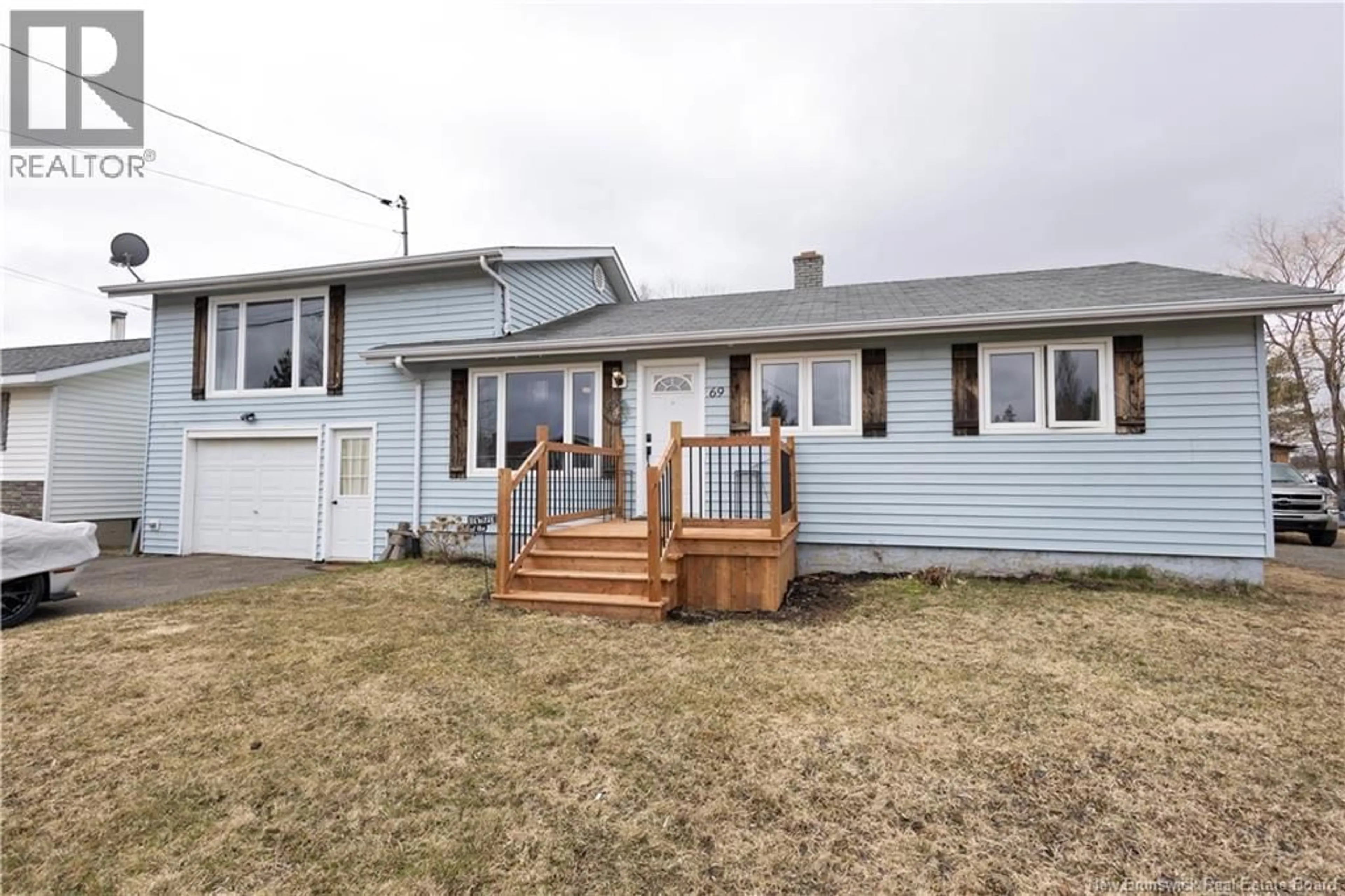 A pic from outside/outdoor area/front of a property/back of a property/a pic from drone, street for 69 CENTENNIAL STREET, Plaster Rock New Brunswick E7G1J1