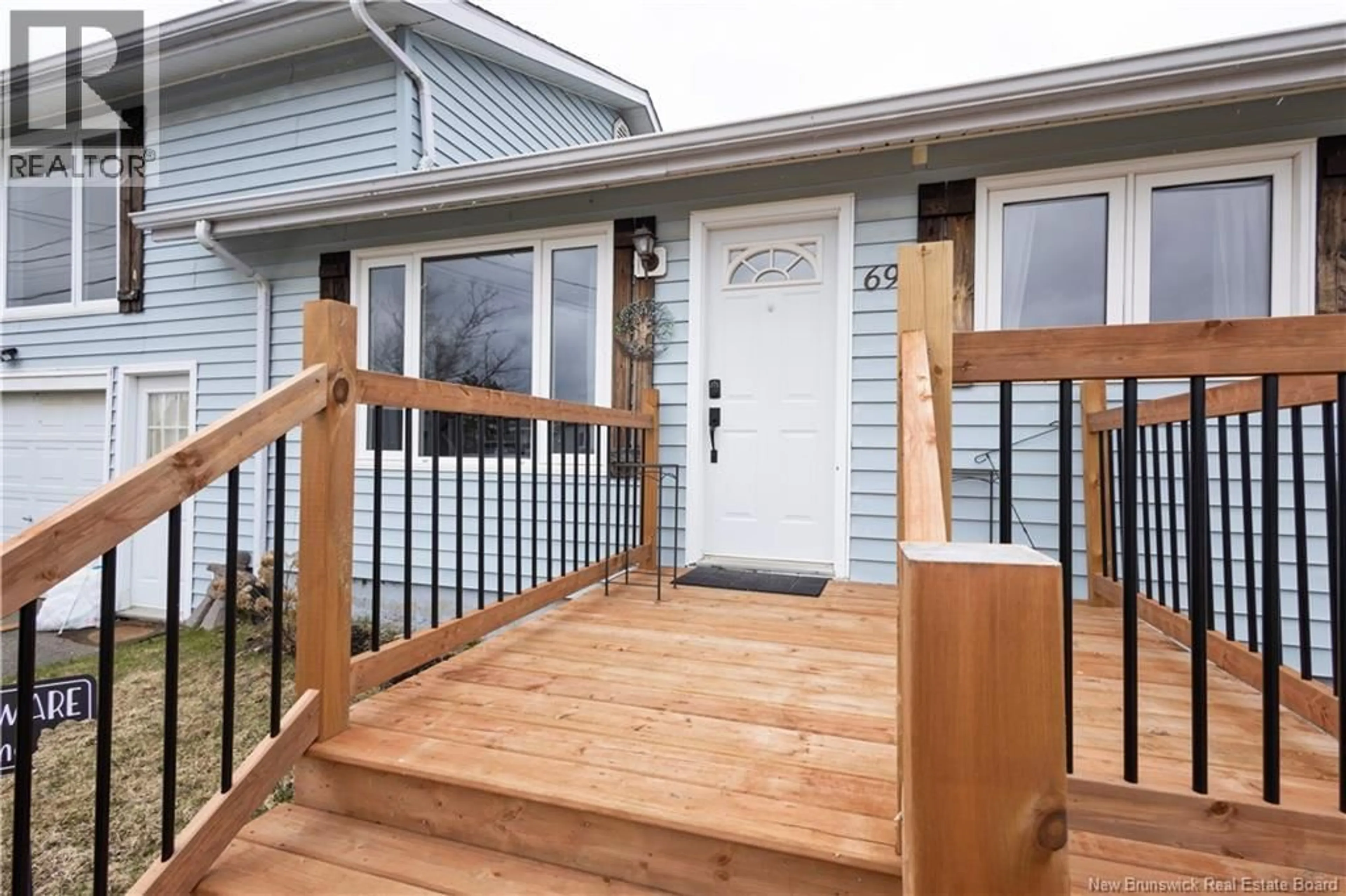 Home with vinyl exterior material, street for 69 CENTENNIAL STREET, Plaster Rock New Brunswick E7G1J1