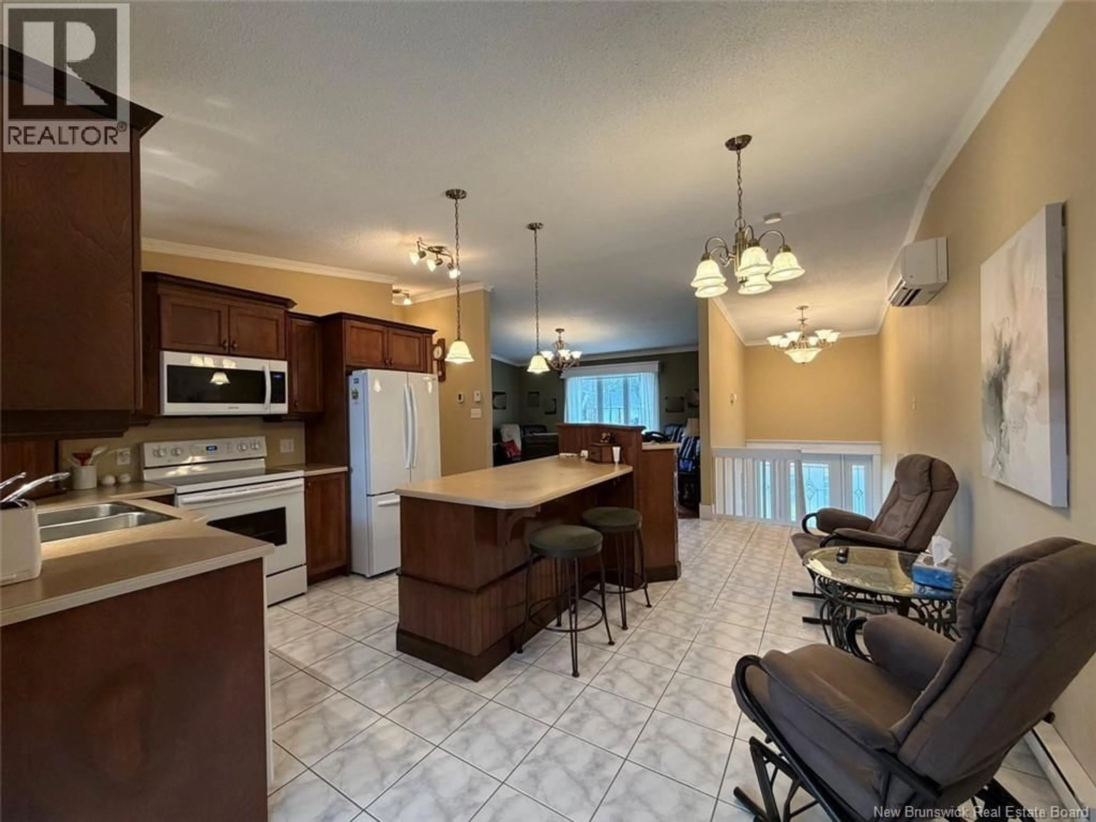Open concept kitchen, ceramic/tile floor for 76 MORIN ROAD, Saint-Joseph New Brunswick E7B2T1