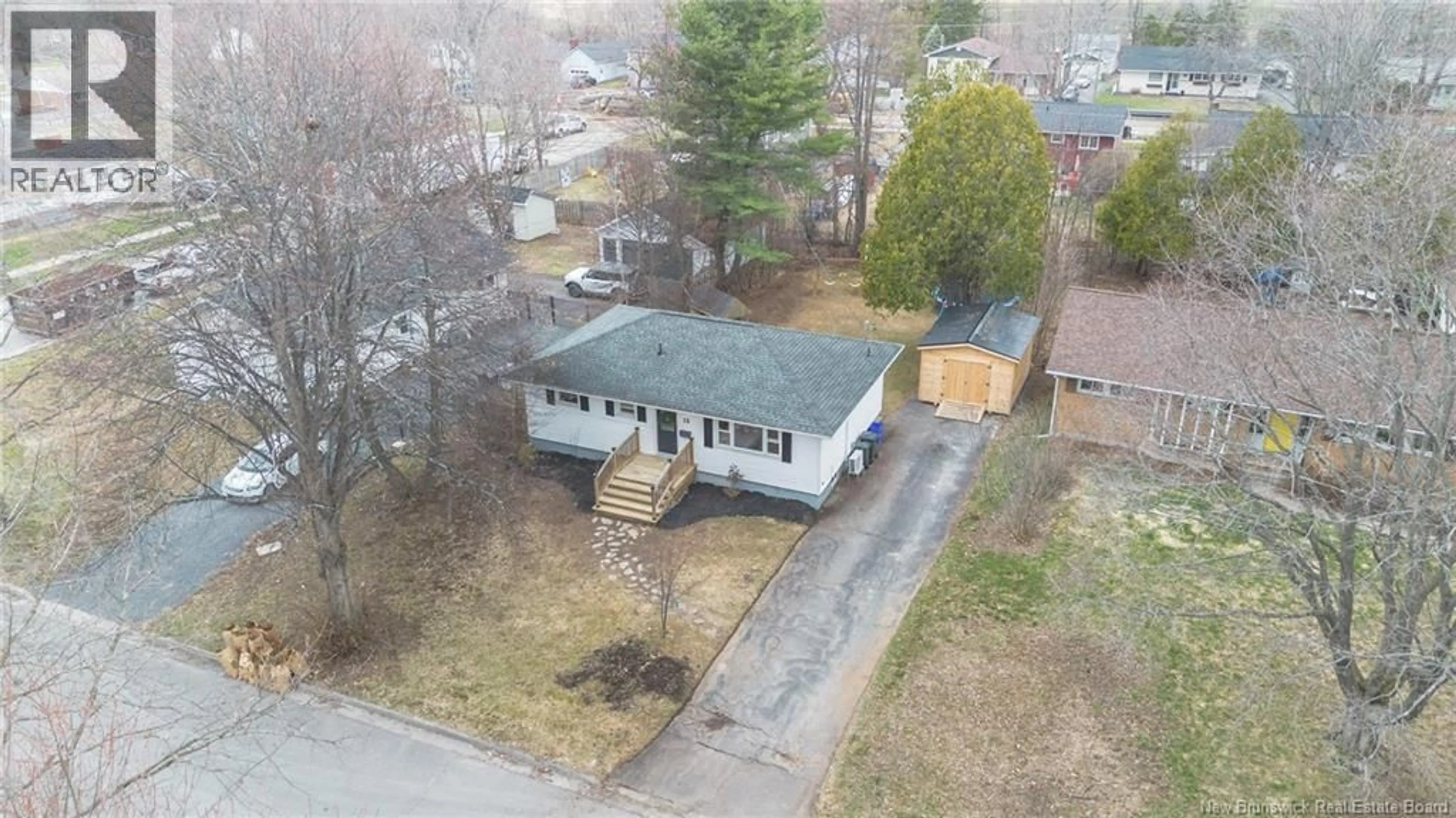 A pic from outside/outdoor area/front of a property/back of a property/a pic from drone, street for 15 BURSE COURT, Fredericton New Brunswick E3A3C7