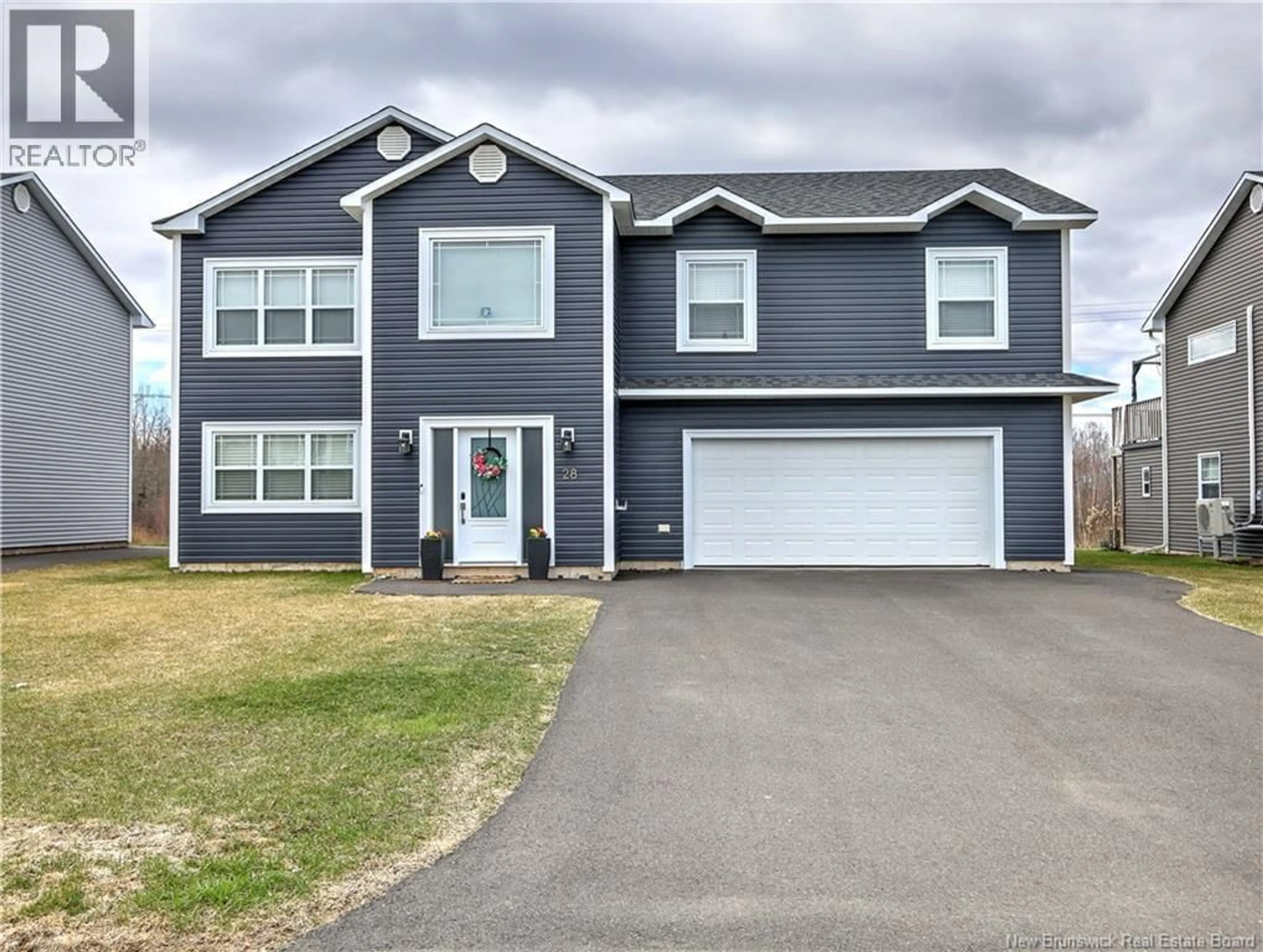 Home with vinyl exterior material, street for 28 DOHERTY DRIVE, Oromocto New Brunswick E2V0M1