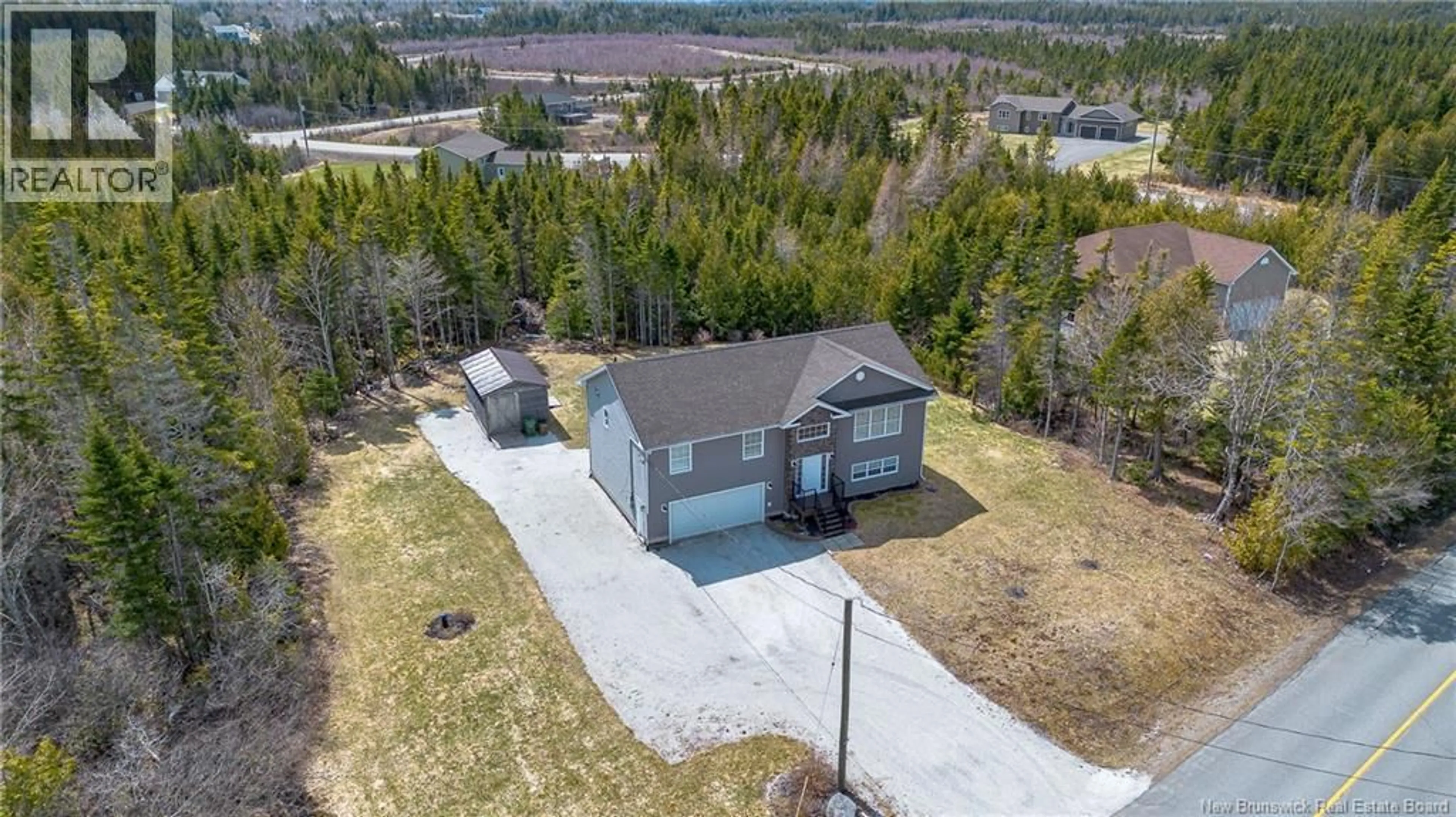 A pic from outside/outdoor area/front of a property/back of a property/a pic from drone, water/lake/river/ocean view for 700 HILLCREST ROAD, Saint John New Brunswick E2N0E3