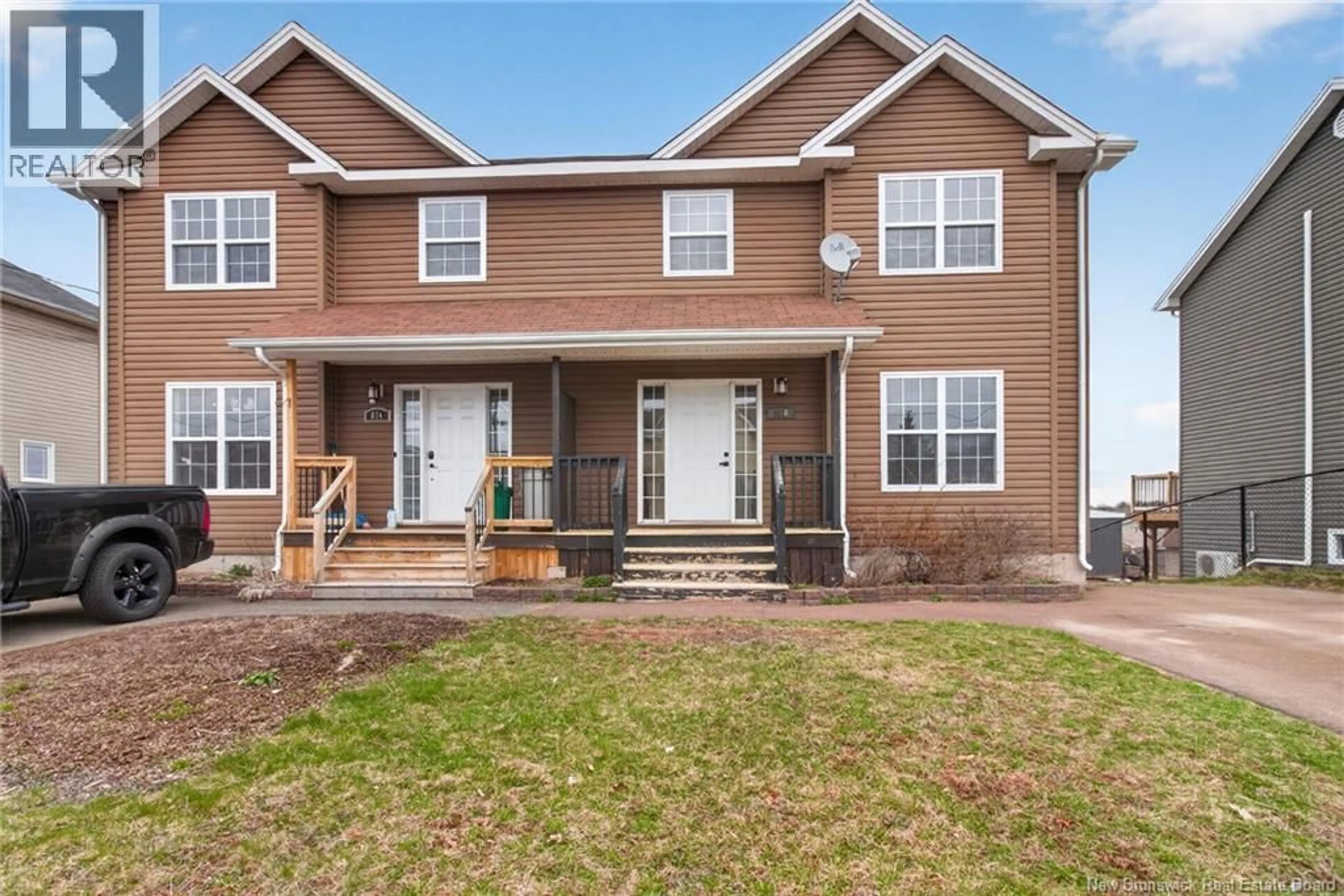 Home with vinyl exterior material, street for 876 BERNARD STREET, Dieppe New Brunswick E1A5A4