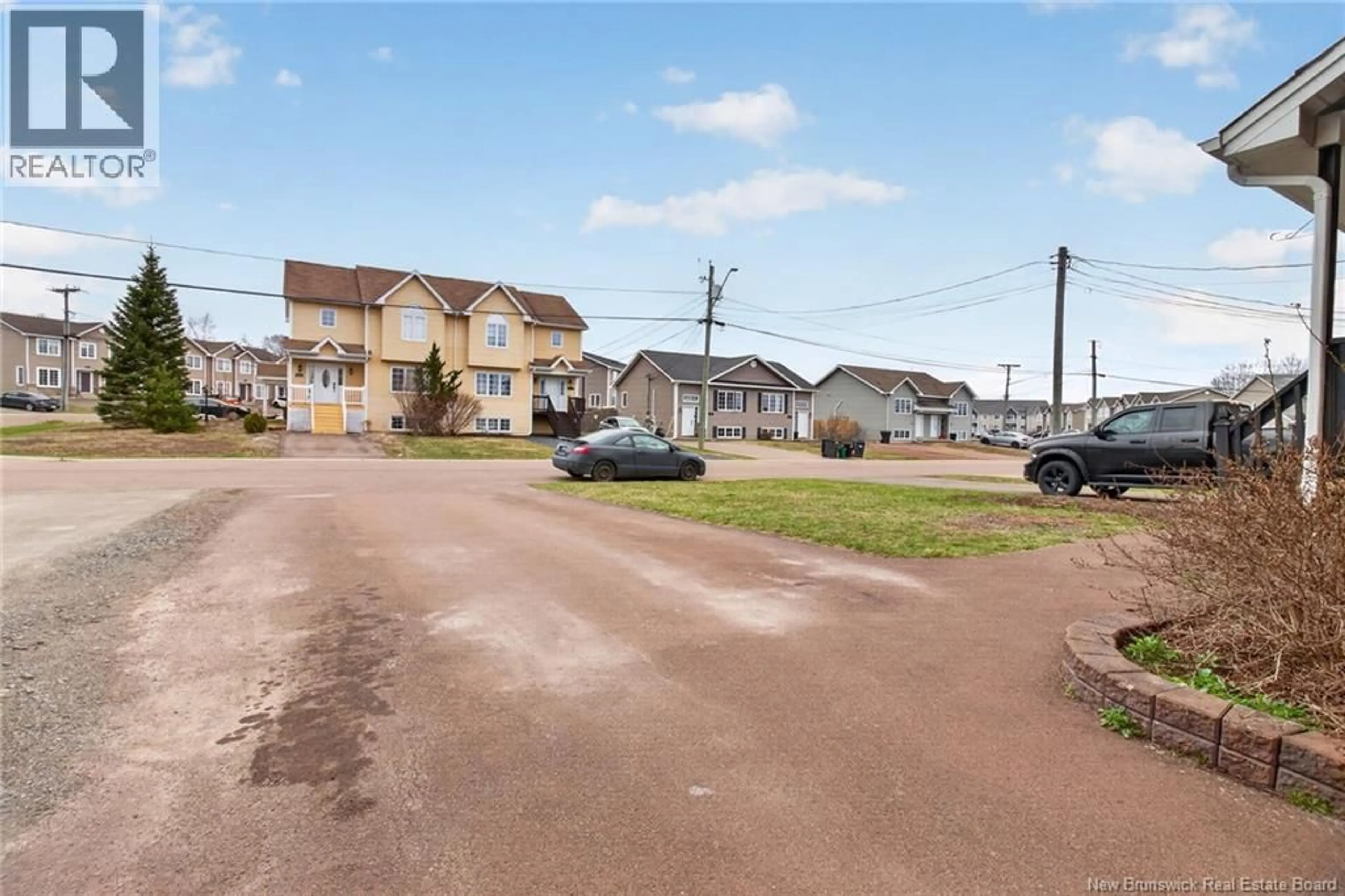 A pic from outside/outdoor area/front of a property/back of a property/a pic from drone, street for 876 BERNARD STREET, Dieppe New Brunswick E1A5A4