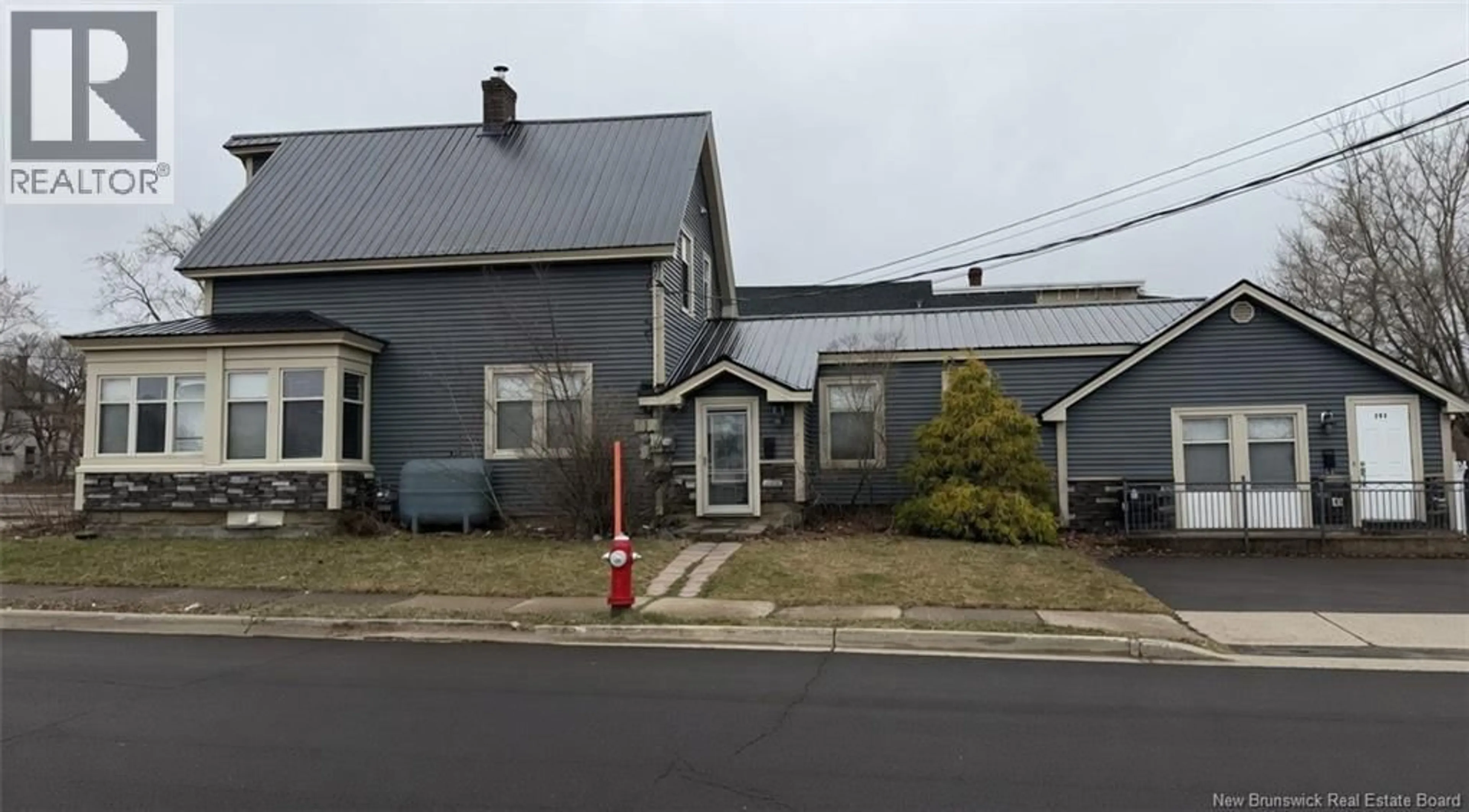 A pic from outside/outdoor area/front of a property/back of a property/a pic from drone, street for 203 MOUNTAIN ROAD, Moncton New Brunswick E1C2L5