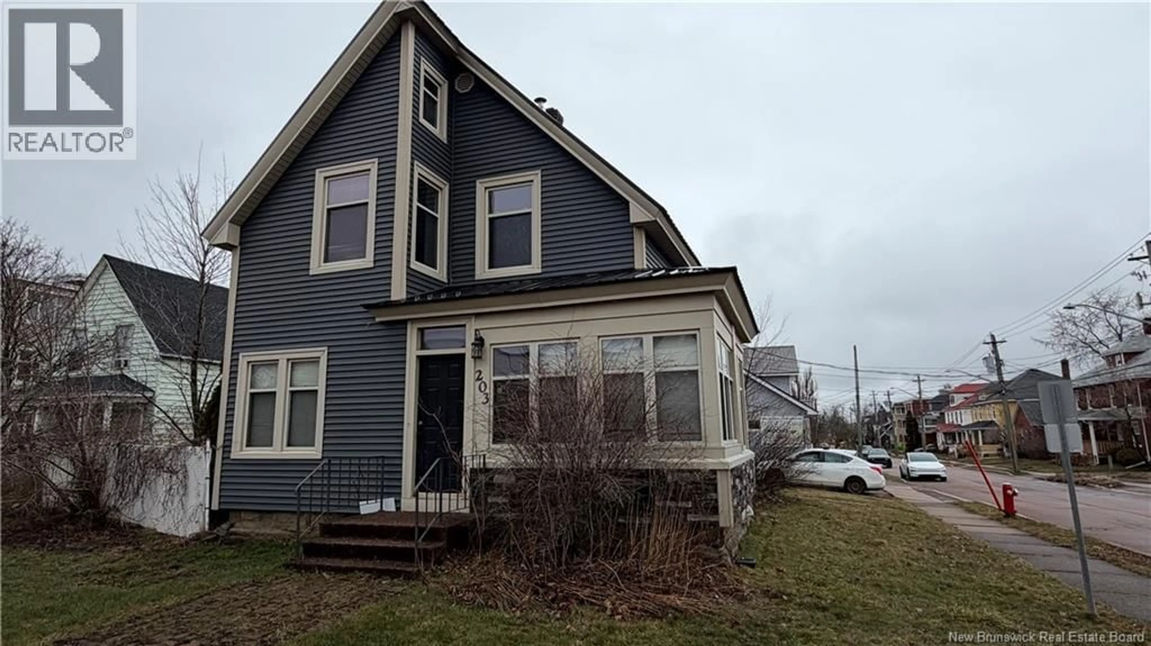 Home with vinyl exterior material, street for 203 MOUNTAIN ROAD, Moncton New Brunswick E1C2L5
