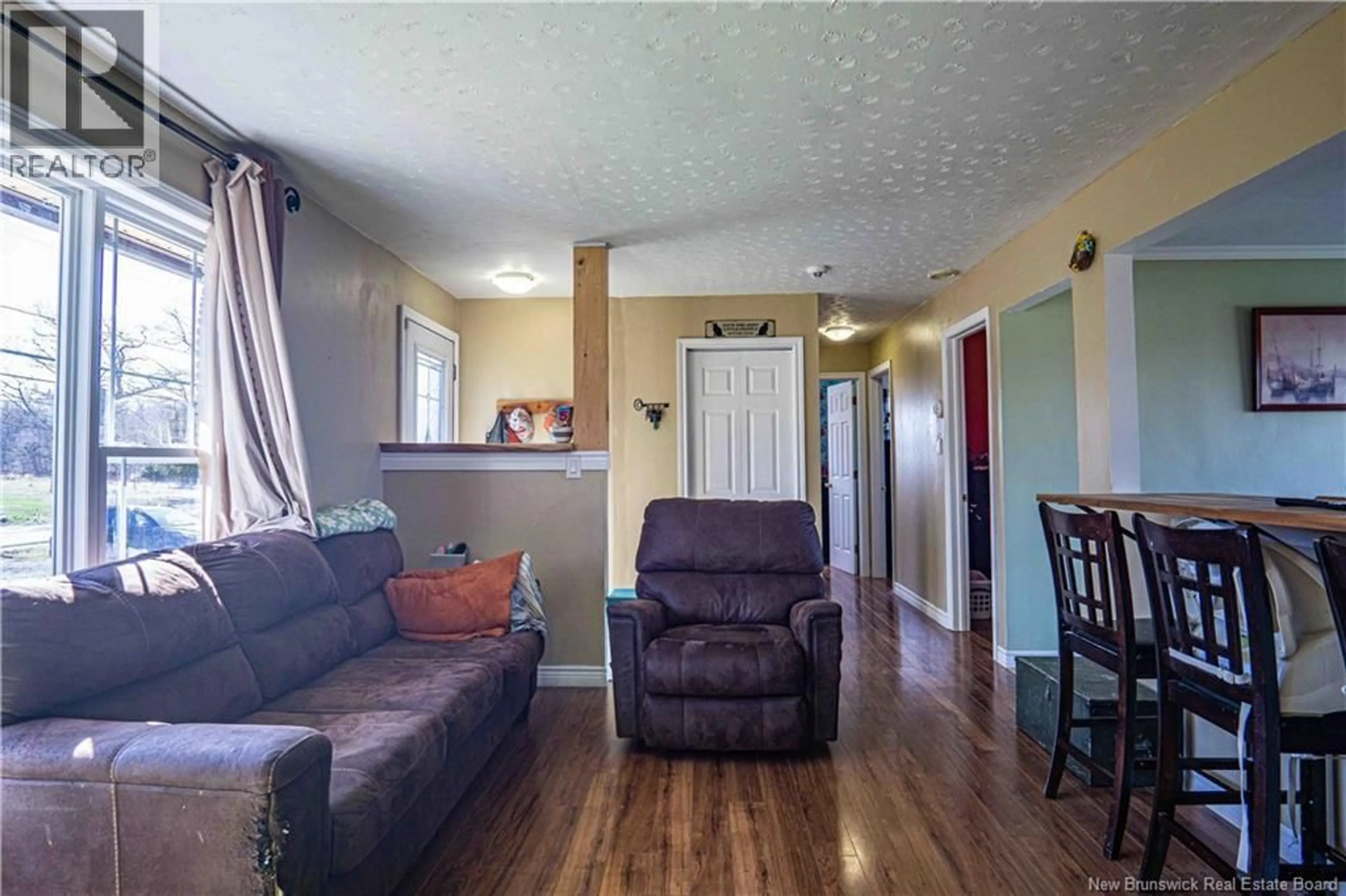 Living room with furniture, wood/laminate floor for 473 ROUTE 102, Burton New Brunswick E2V3K3