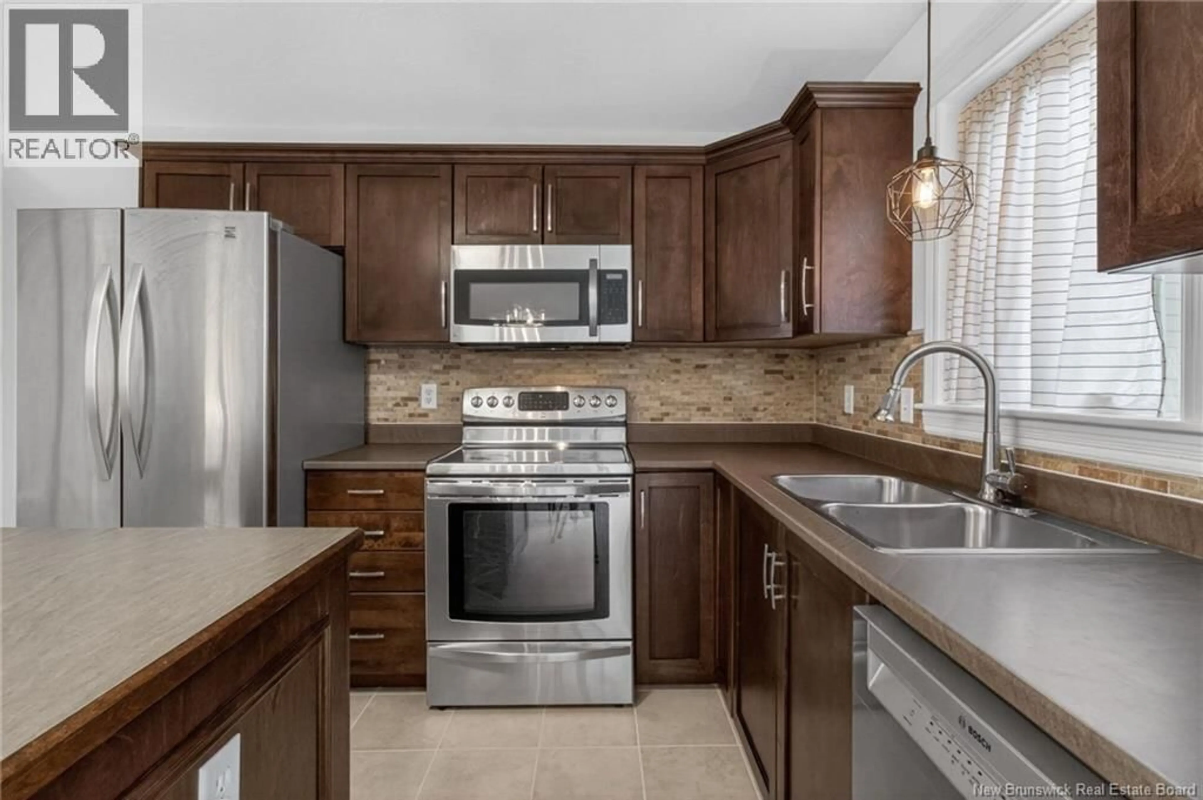 Open concept kitchen, ceramic/tile floor for 18 LADY RUSSELL, Moncton New Brunswick E1E0C2