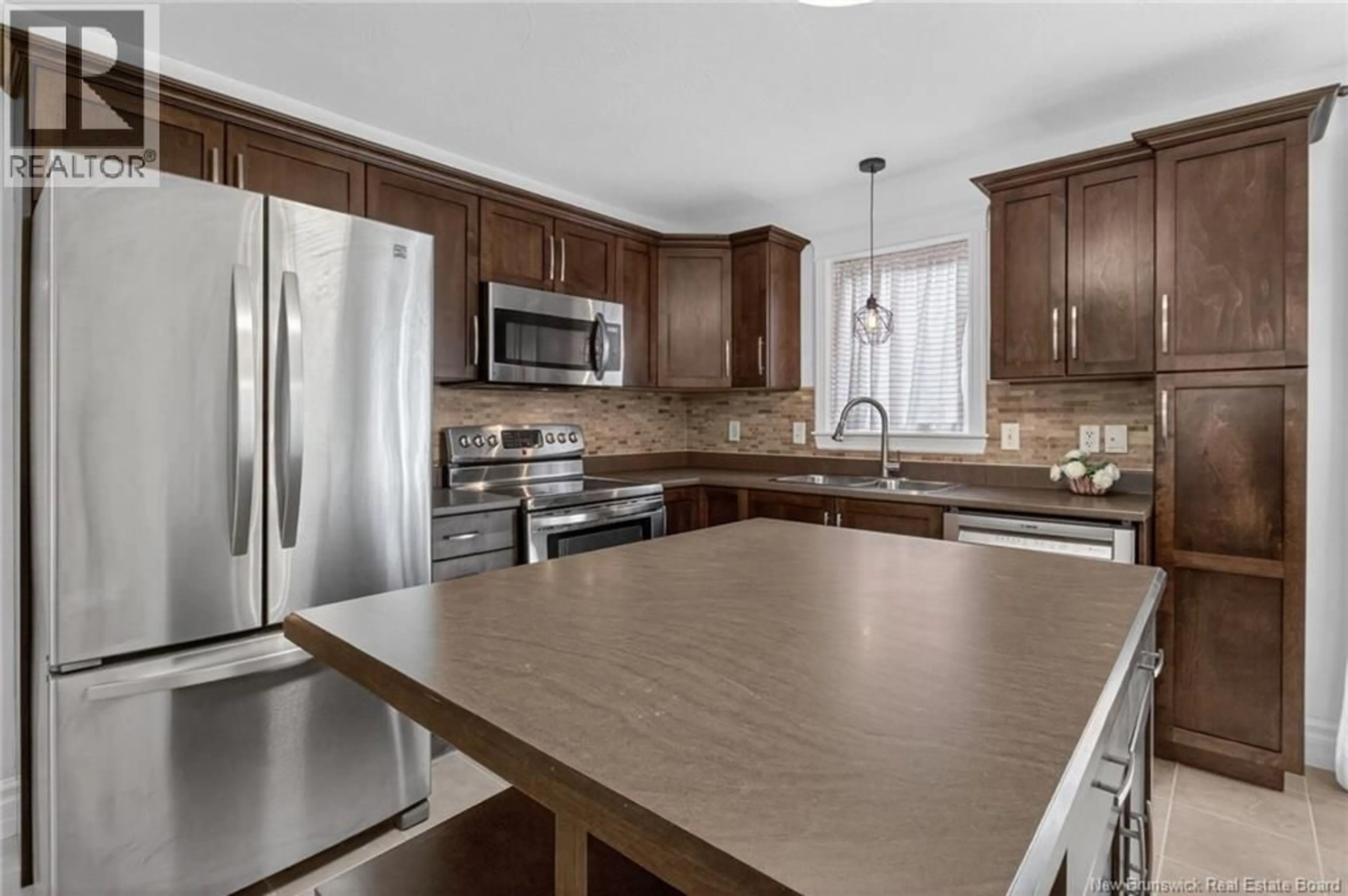 Open concept kitchen, ceramic/tile floor for 18 LADY RUSSELL, Moncton New Brunswick E1E0C2