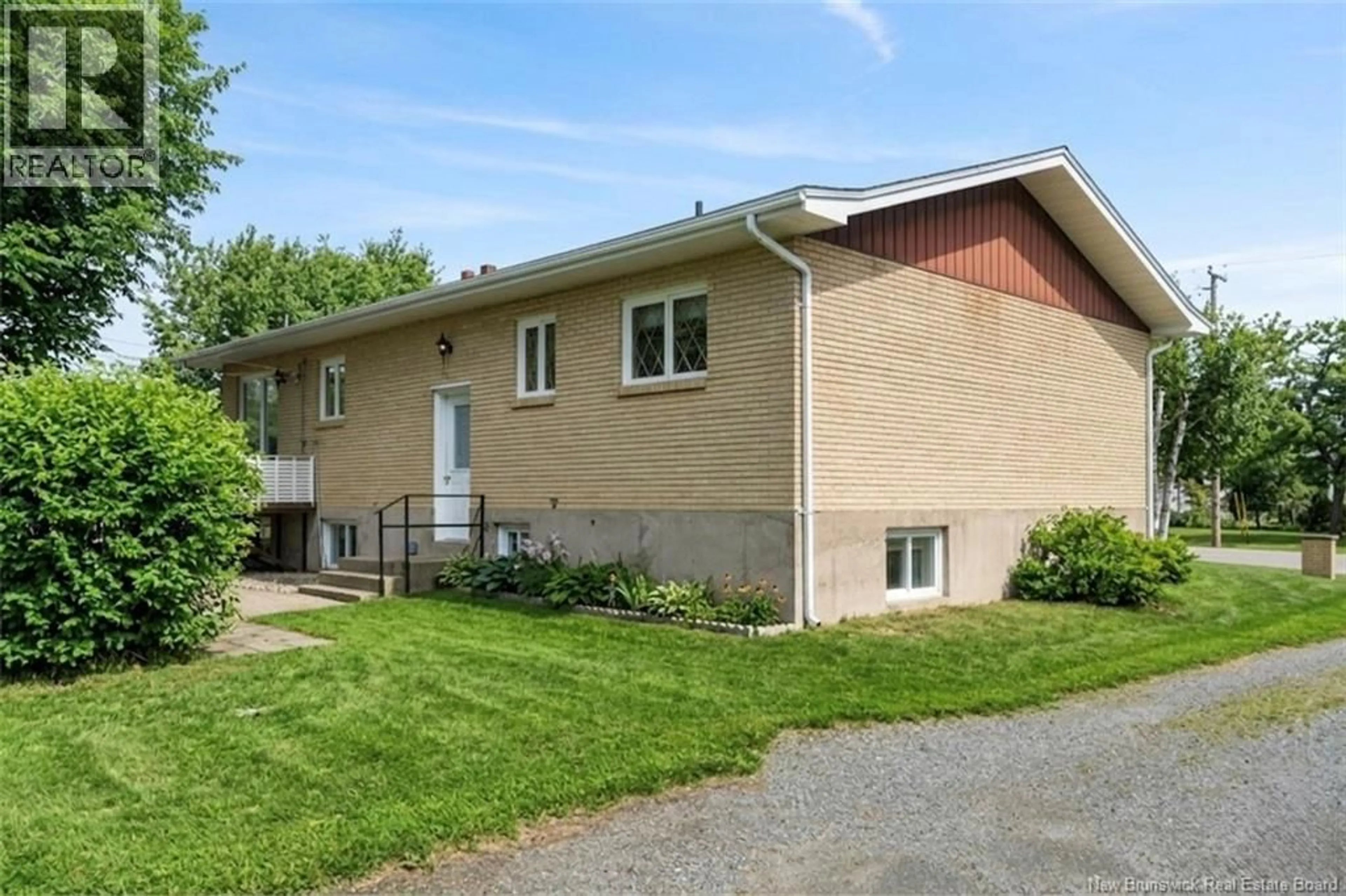 Home with vinyl exterior material, street for 57 RUE L'ANGLAIS, Petit-Rocher New Brunswick E8J1J1