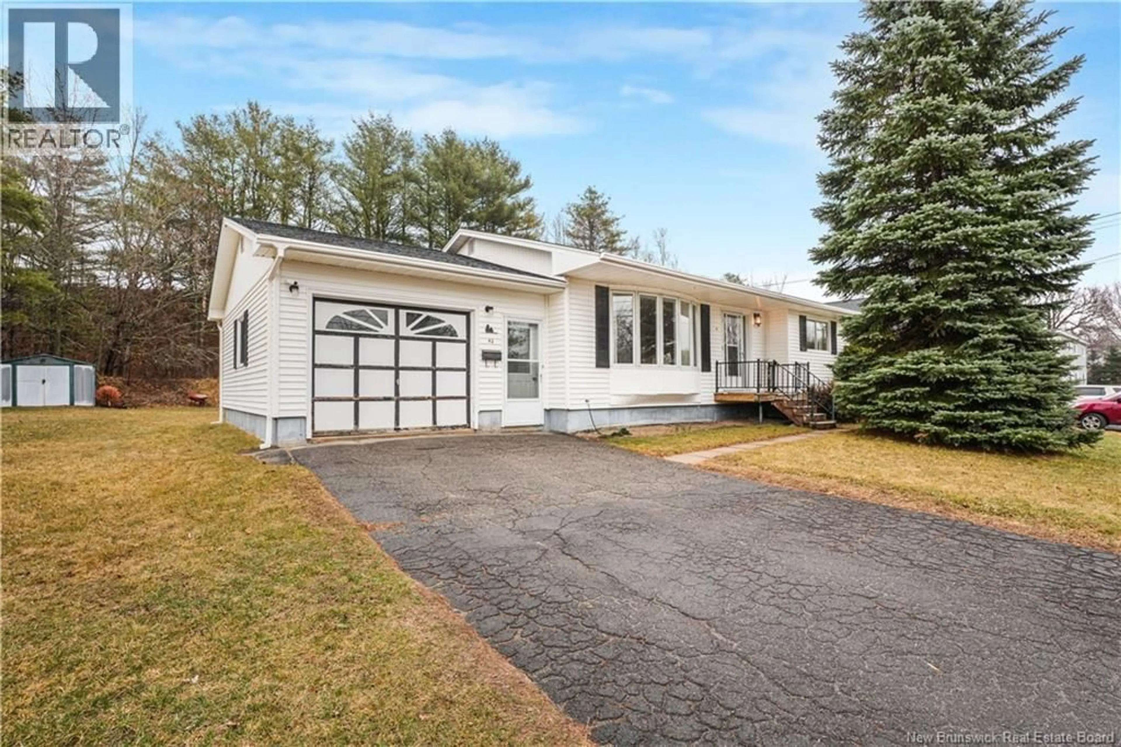 Home with vinyl exterior material, street for 42 RIVER STREET, Fredericton New Brunswick E3A4L7