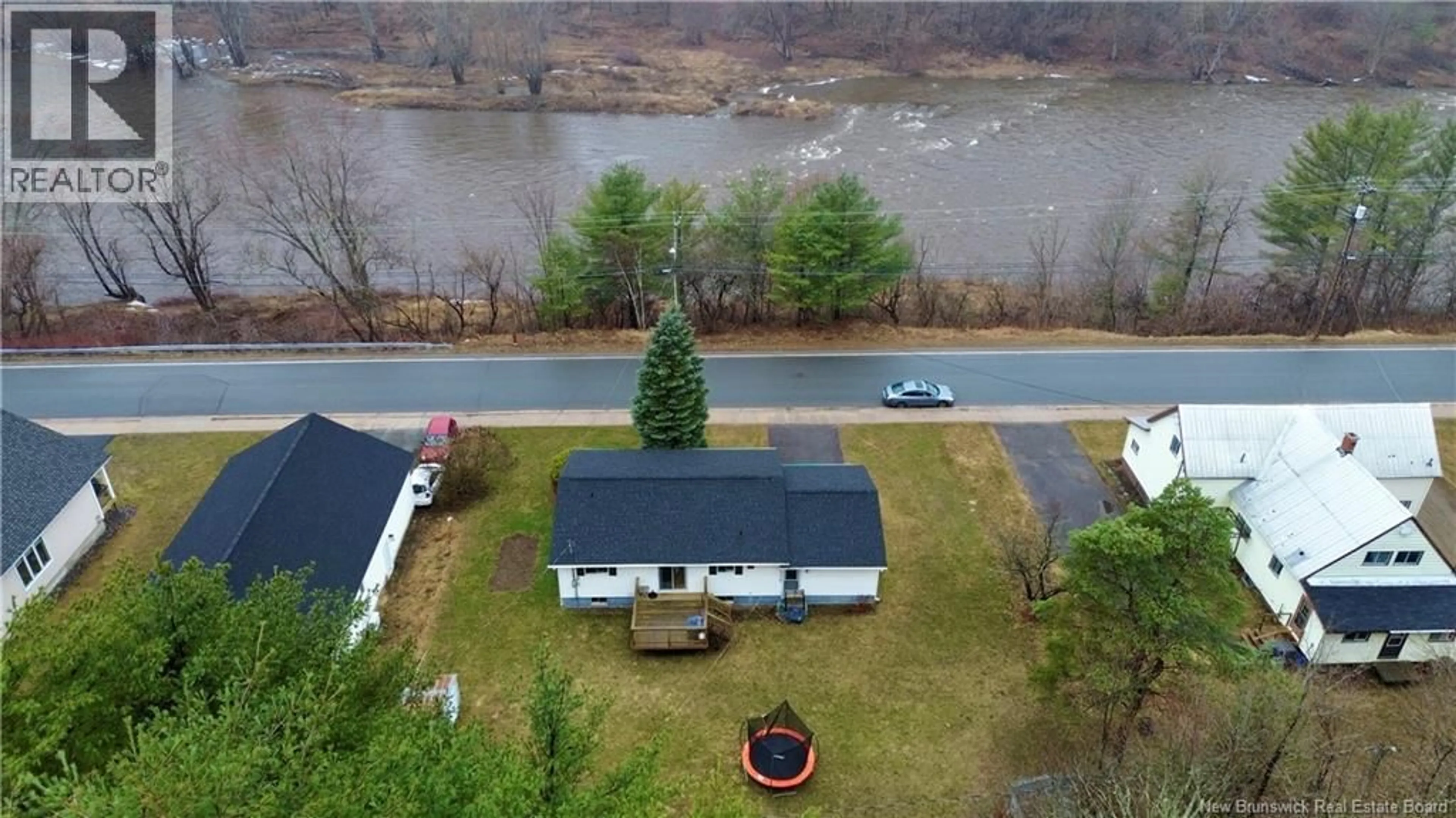 A pic from outside/outdoor area/front of a property/back of a property/a pic from drone, water/lake/river/ocean view for 42 RIVER STREET, Fredericton New Brunswick E3A4L7