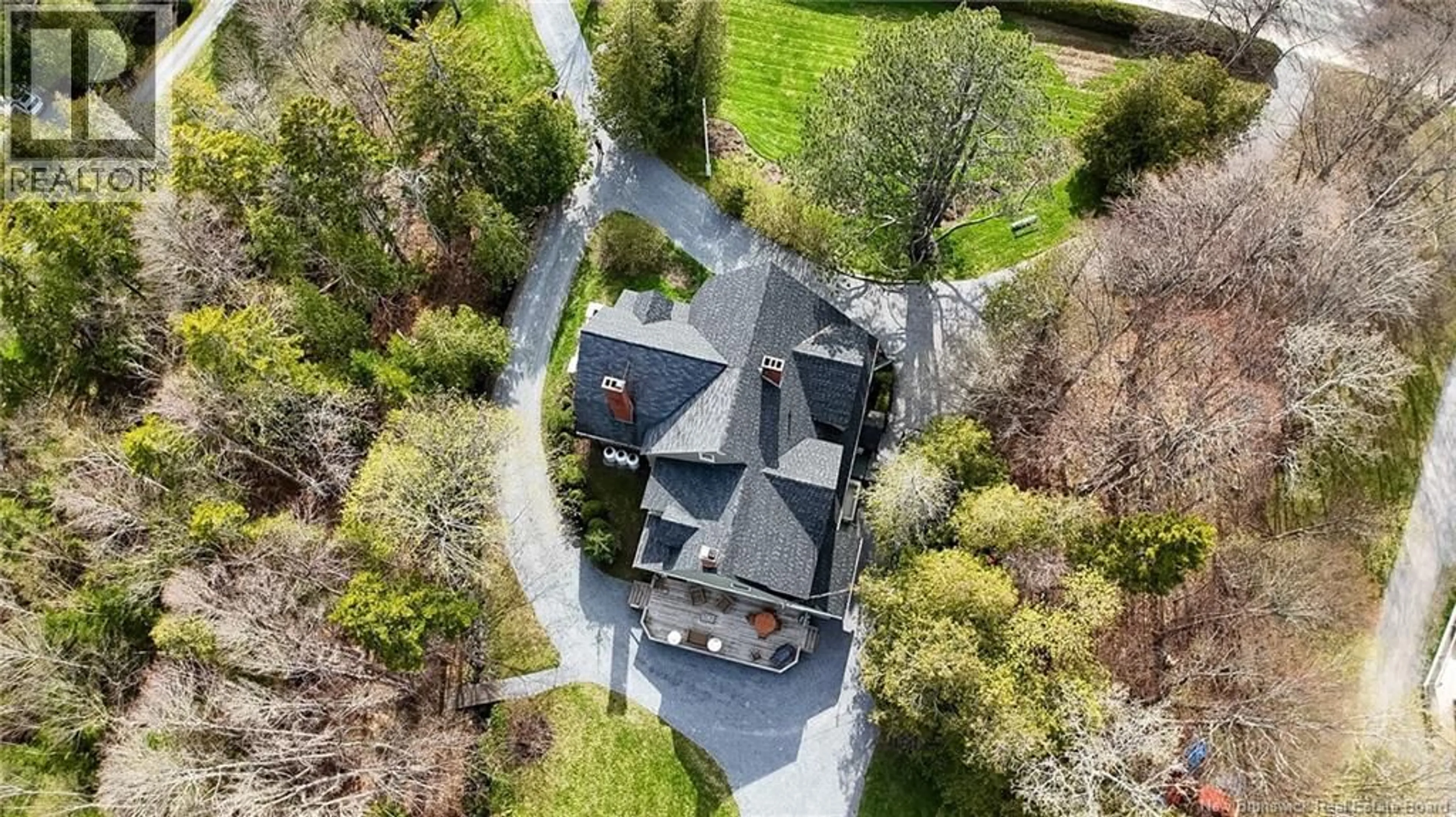 A pic from outside/outdoor area/front of a property/back of a property/a pic from drone, street for 48 GONDOLA POINT ROAD, Rothesay New Brunswick E2E5K2