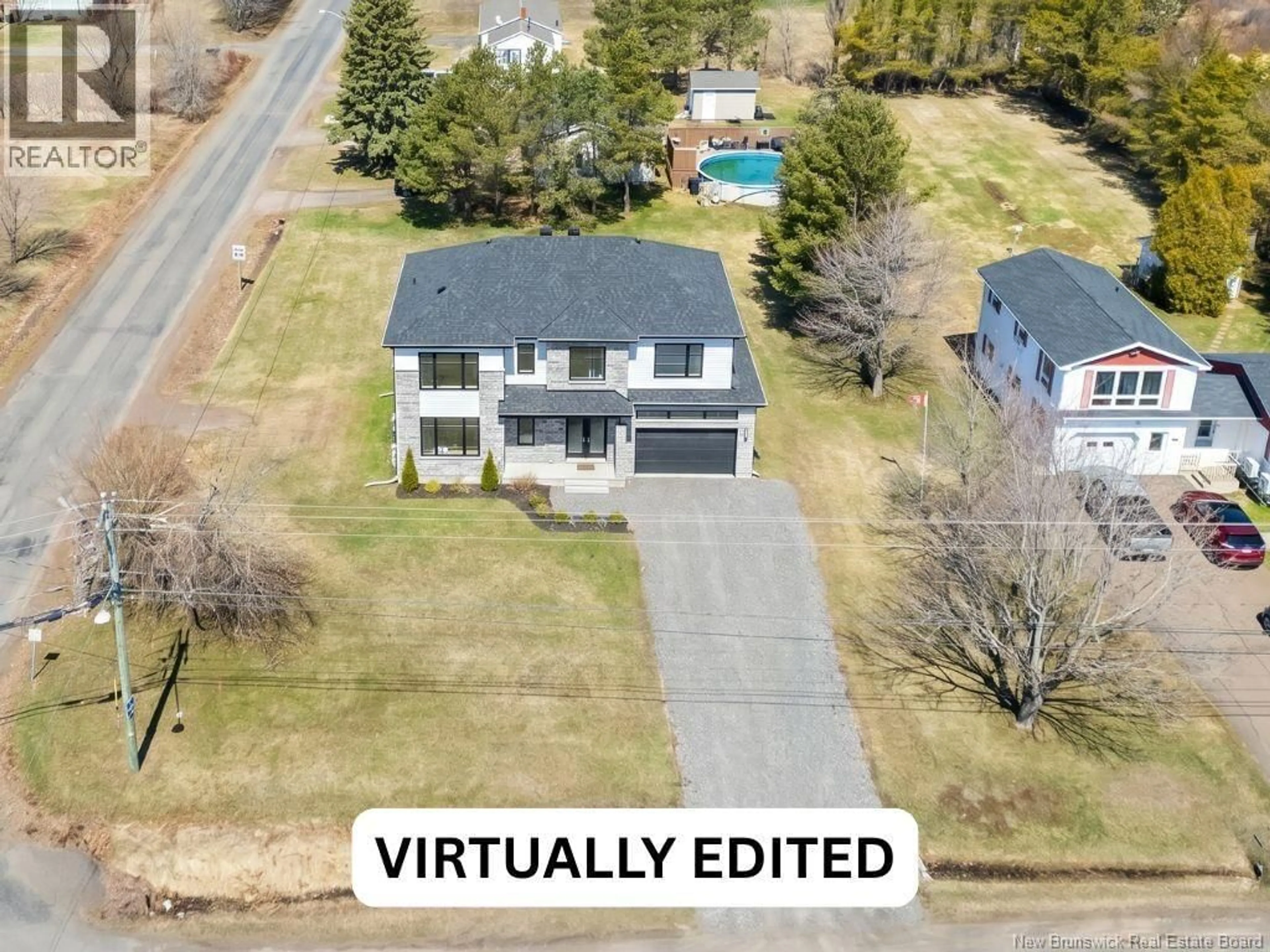 A pic from outside/outdoor area/front of a property/back of a property/a pic from drone, street for 483 ROUTE 475, Bouctouche New Brunswick E4S4N9