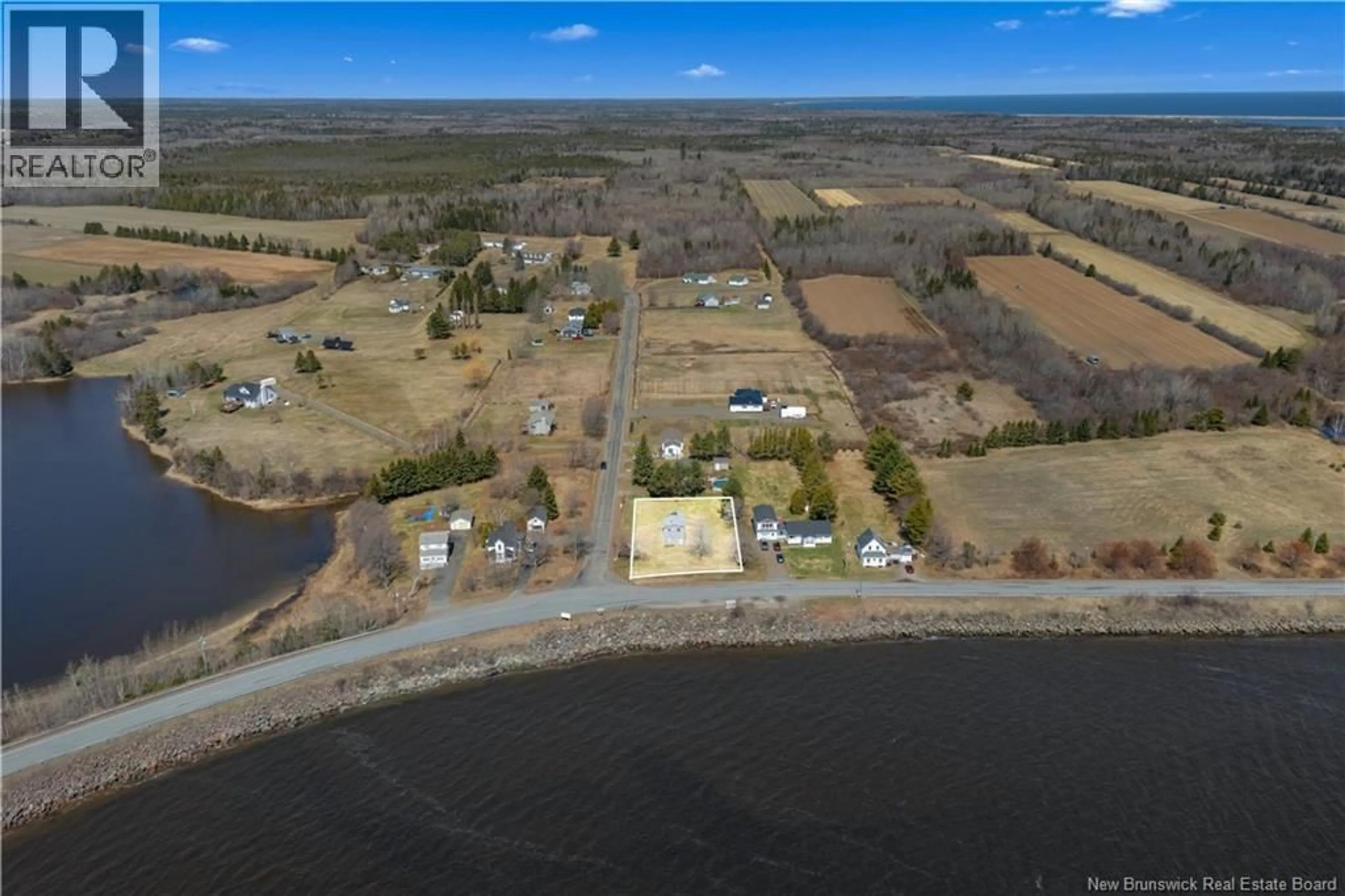 A pic from outside/outdoor area/front of a property/back of a property/a pic from drone, water/lake/river/ocean view for 483 ROUTE 475, Bouctouche New Brunswick E4S4N9