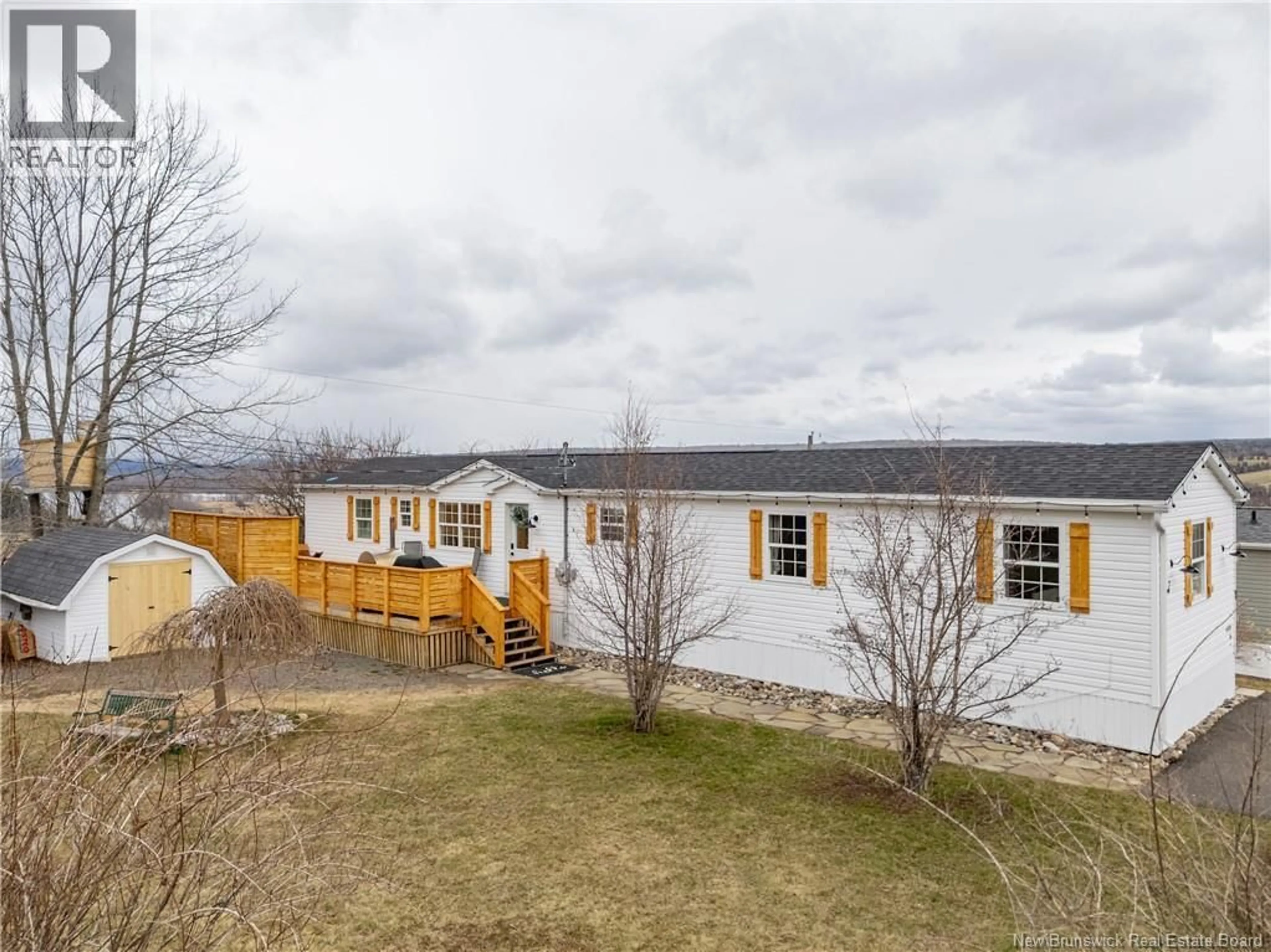 A pic from outside/outdoor area/front of a property/back of a property/a pic from drone, unknown for 7 BARRINGTON ROAD, Fredericton New Brunswick E3C0A5