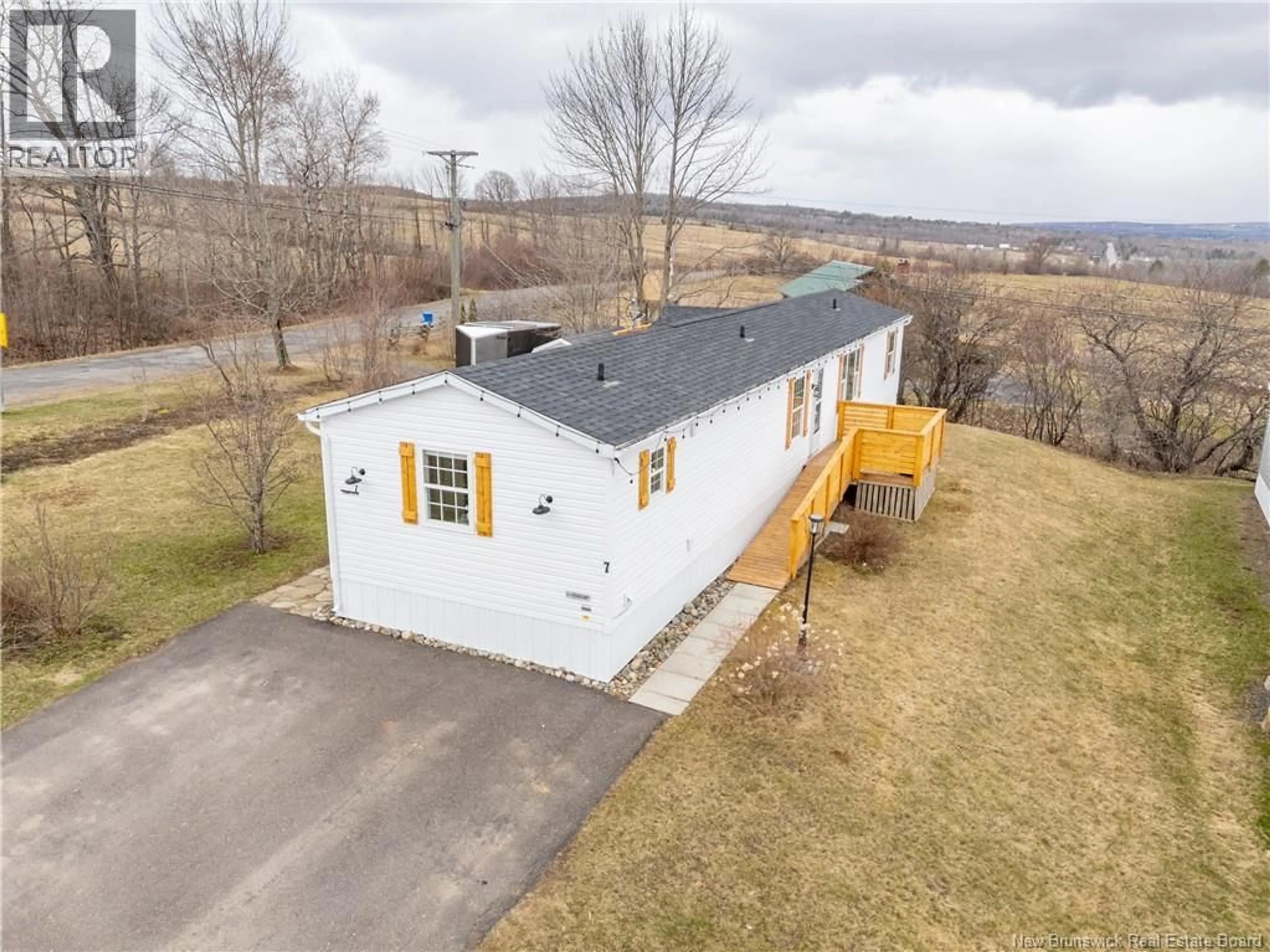 A pic from outside/outdoor area/front of a property/back of a property/a pic from drone, unknown for 7 BARRINGTON ROAD, Fredericton New Brunswick E3C0A5