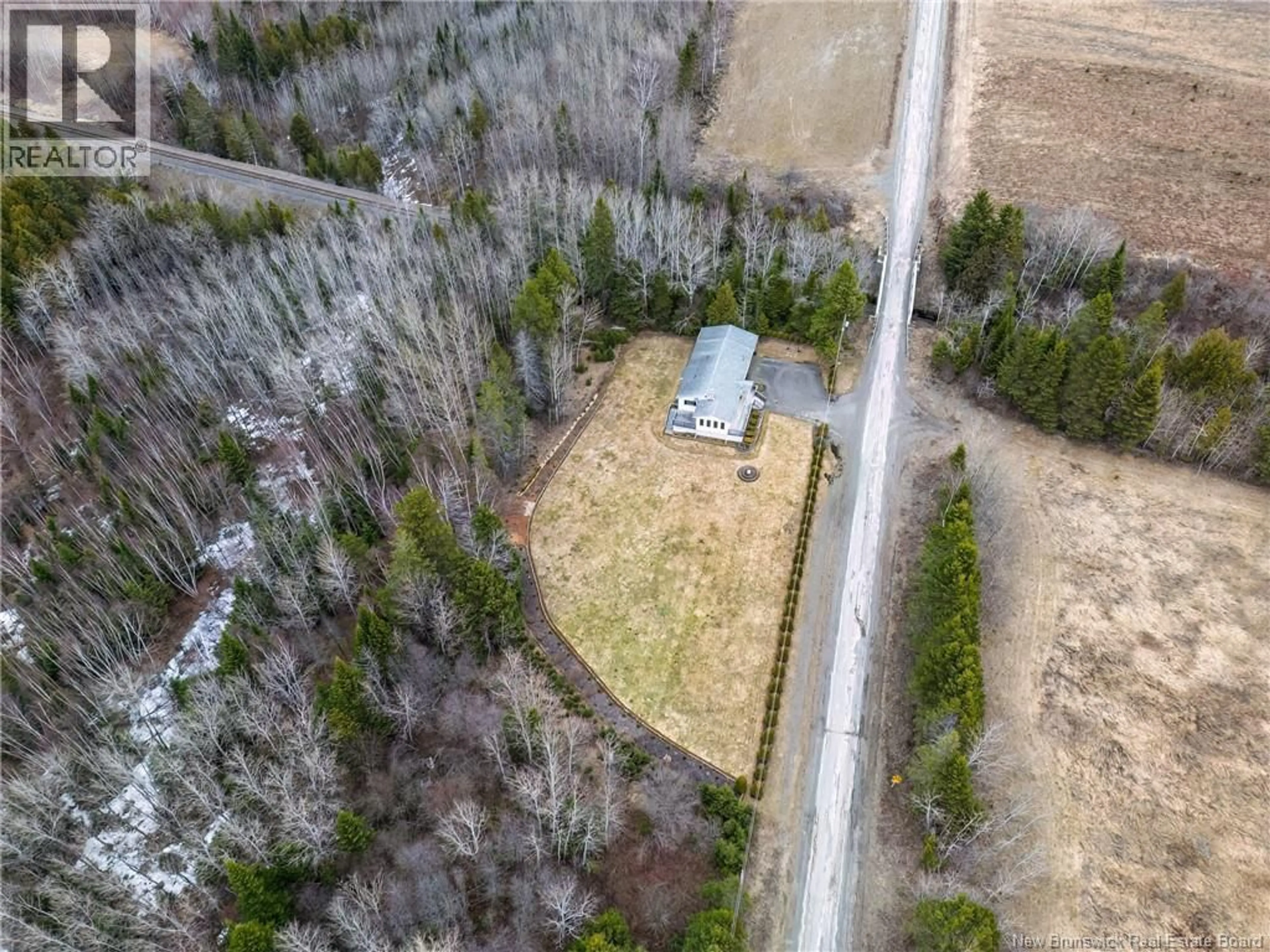 A pic from outside/outdoor area/front of a property/back of a property/a pic from drone, forest/trees view for 41 CEMETERY ROAD, New Denmark New Brunswick E7G1G8