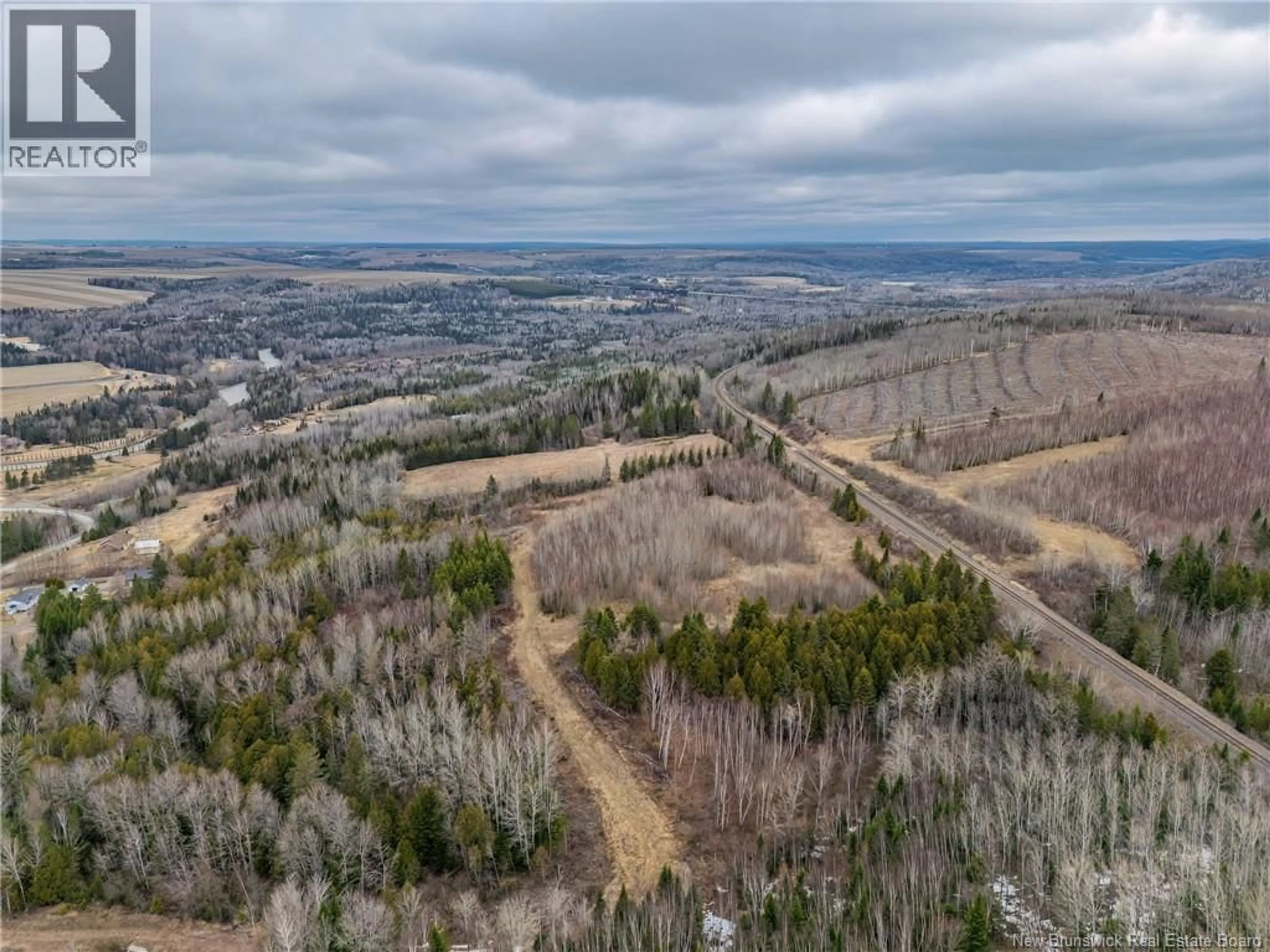 A pic from outside/outdoor area/front of a property/back of a property/a pic from drone, forest/trees view for 41 CEMETERY ROAD, New Denmark New Brunswick E7G1G8