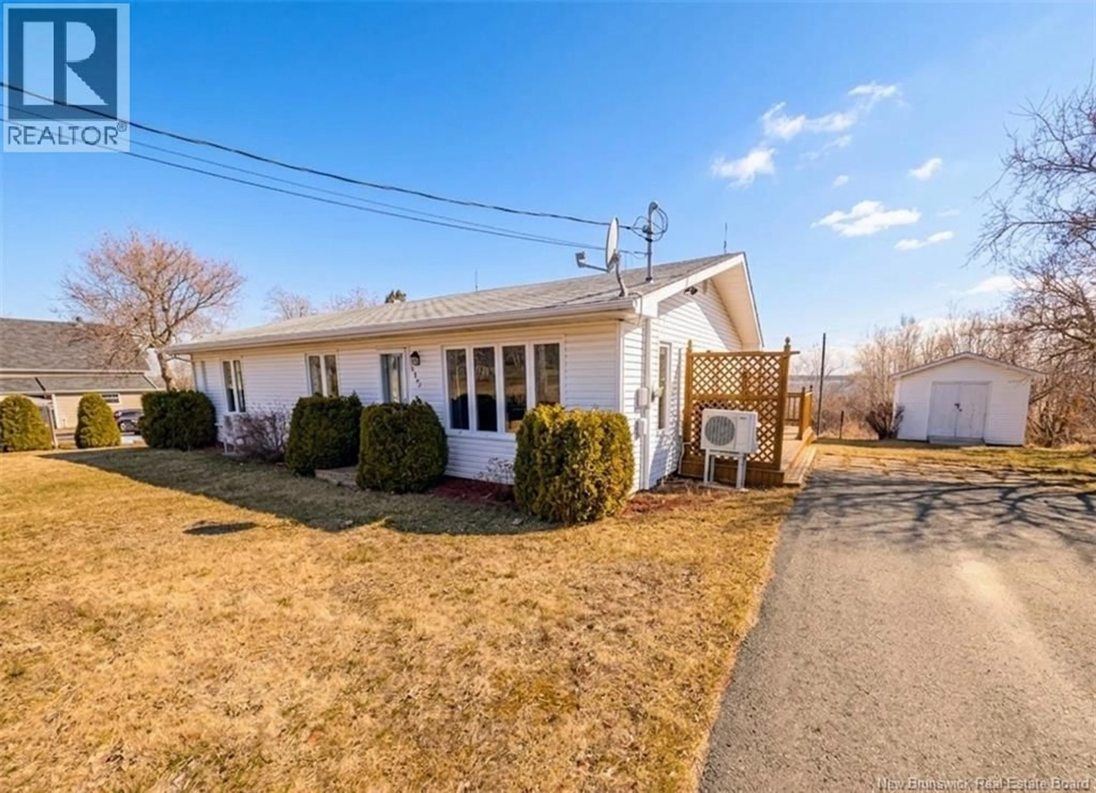 A pic from outside/outdoor area/front of a property/back of a property/a pic from drone, street for 1505-1515 BRIDGE STREET, Bathurst New Brunswick E2A5W7