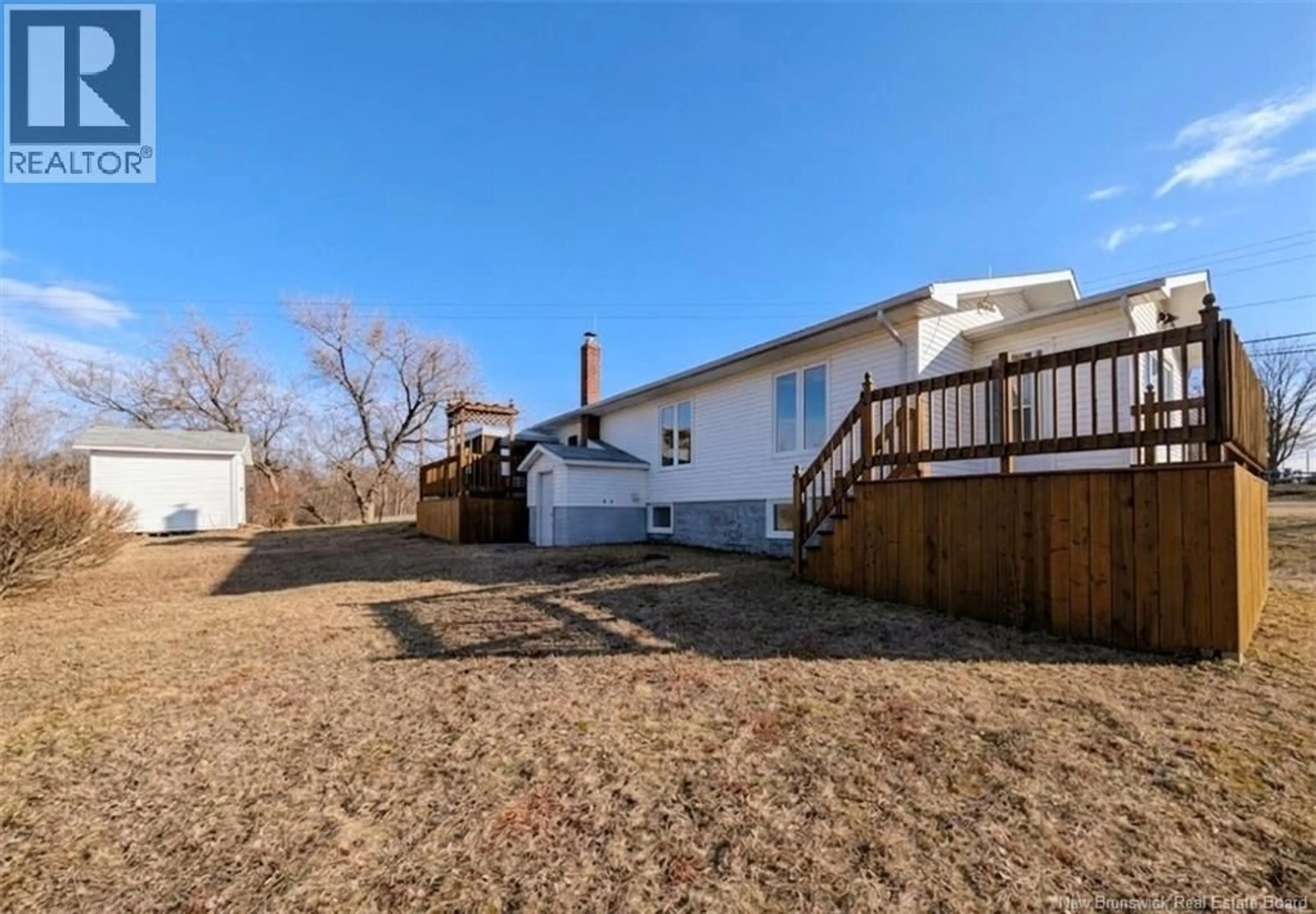 A pic from outside/outdoor area/front of a property/back of a property/a pic from drone, street for 1505-1515 BRIDGE STREET, Bathurst New Brunswick E2A5W7