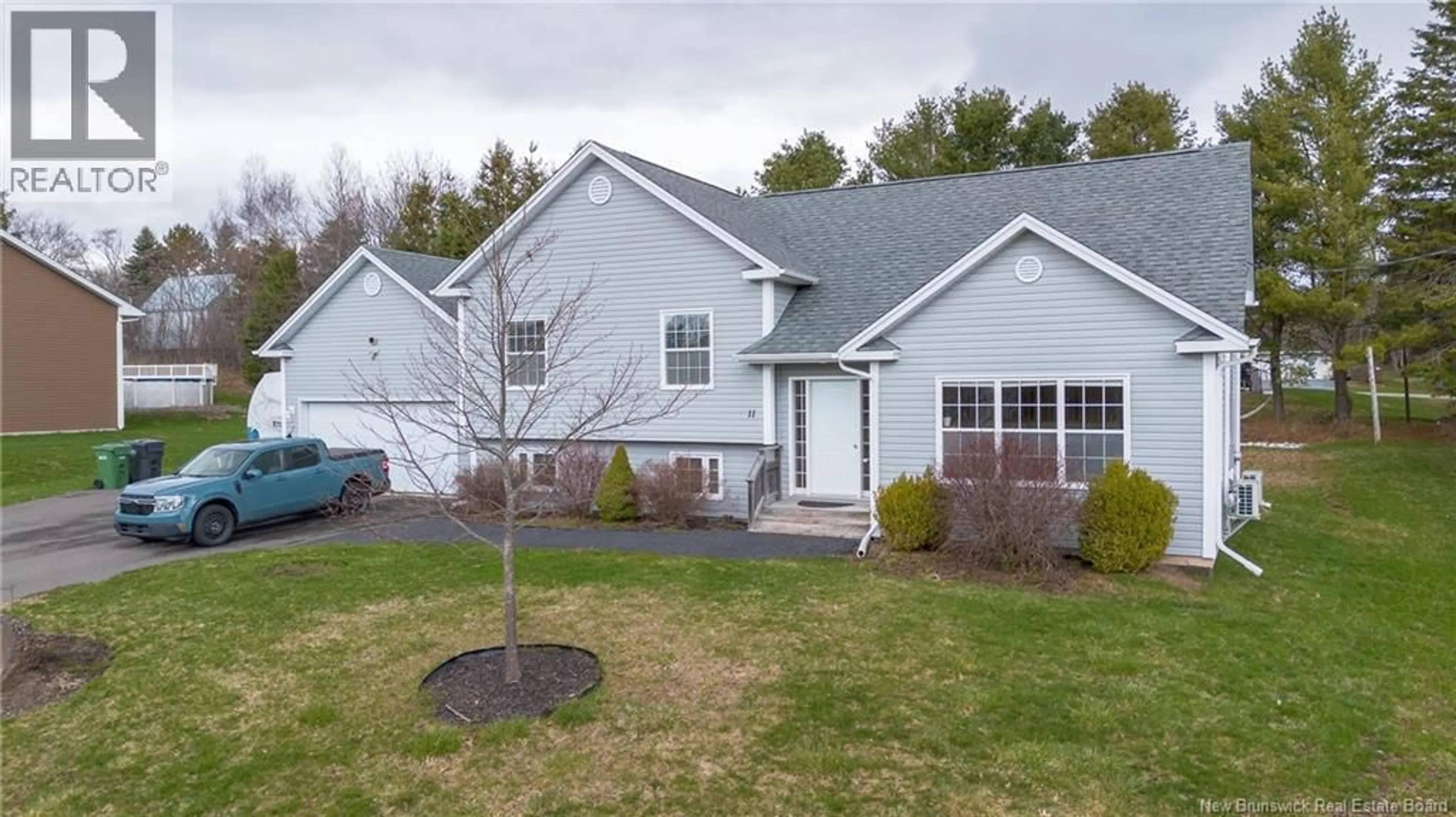 Home with vinyl exterior material, street for 11 HOMESTEAD DRIVE, Hampton New Brunswick E2N5M3