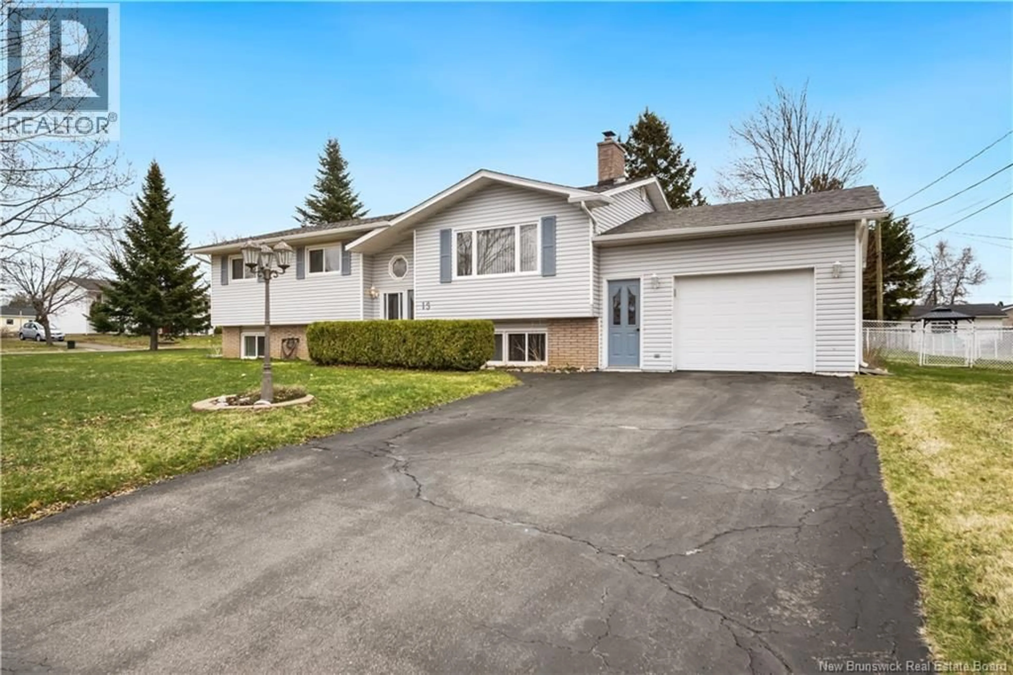 Home with vinyl exterior material, street for 13 TRIDER, Riverview New Brunswick E1B3R7