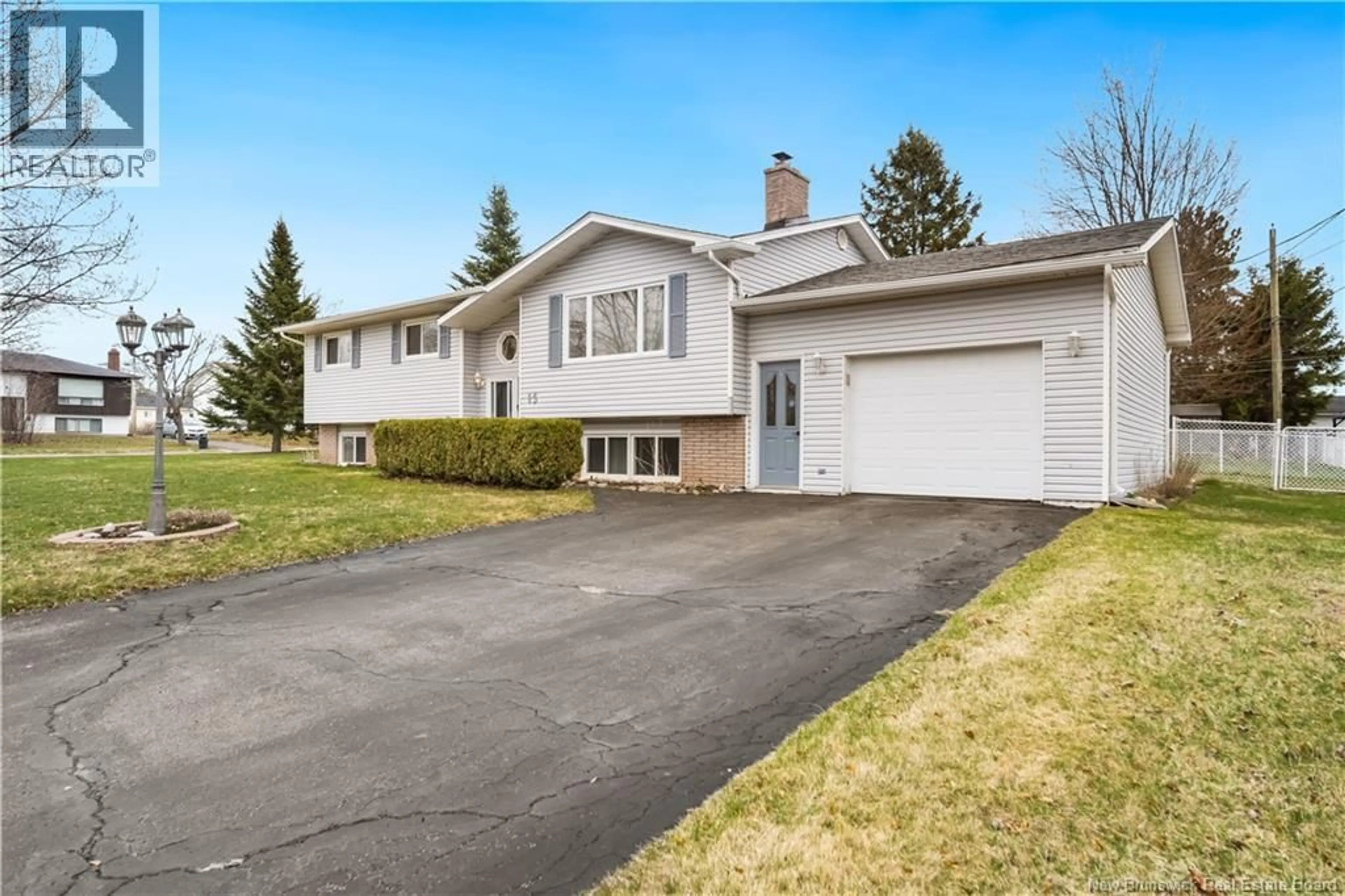 Home with vinyl exterior material, street for 13 TRIDER, Riverview New Brunswick E1B3R7