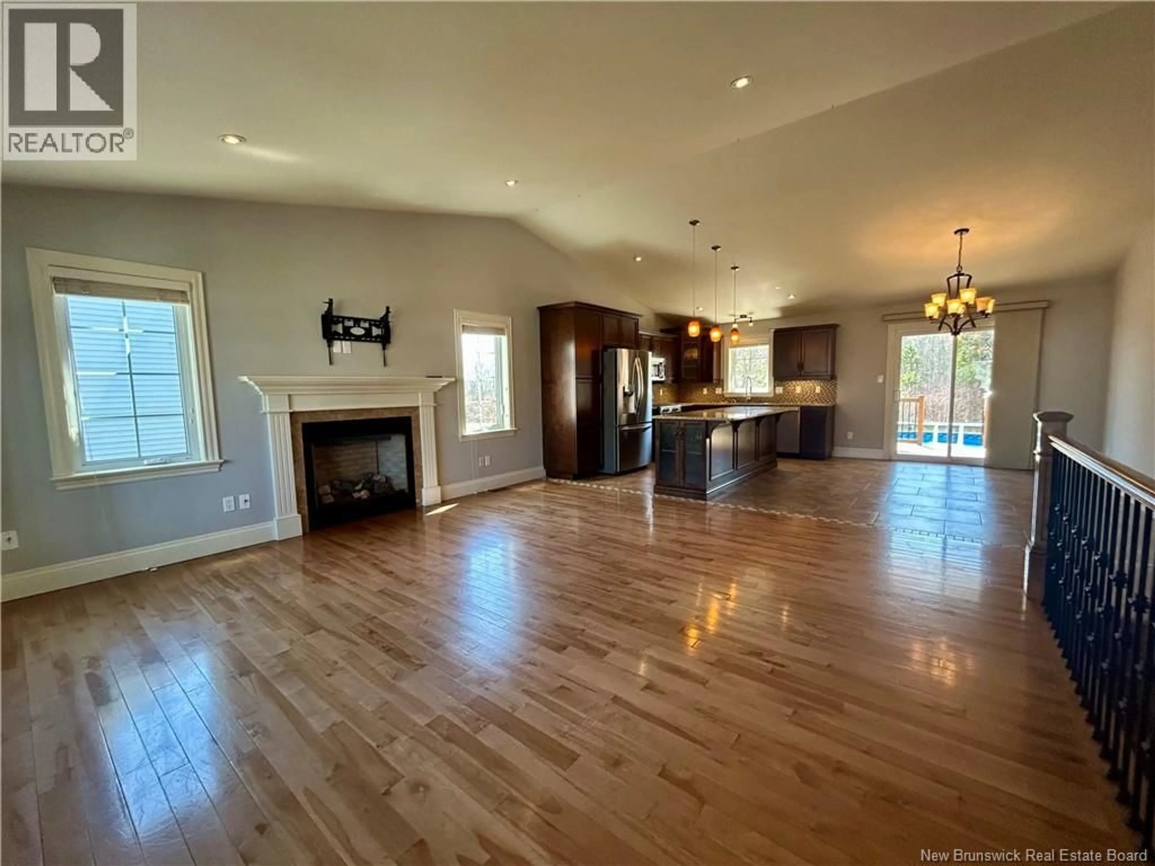 Open concept kitchen, wood/laminate floor for 38 FOREST GROVE ROAD, Moncton New Brunswick E1G5K5