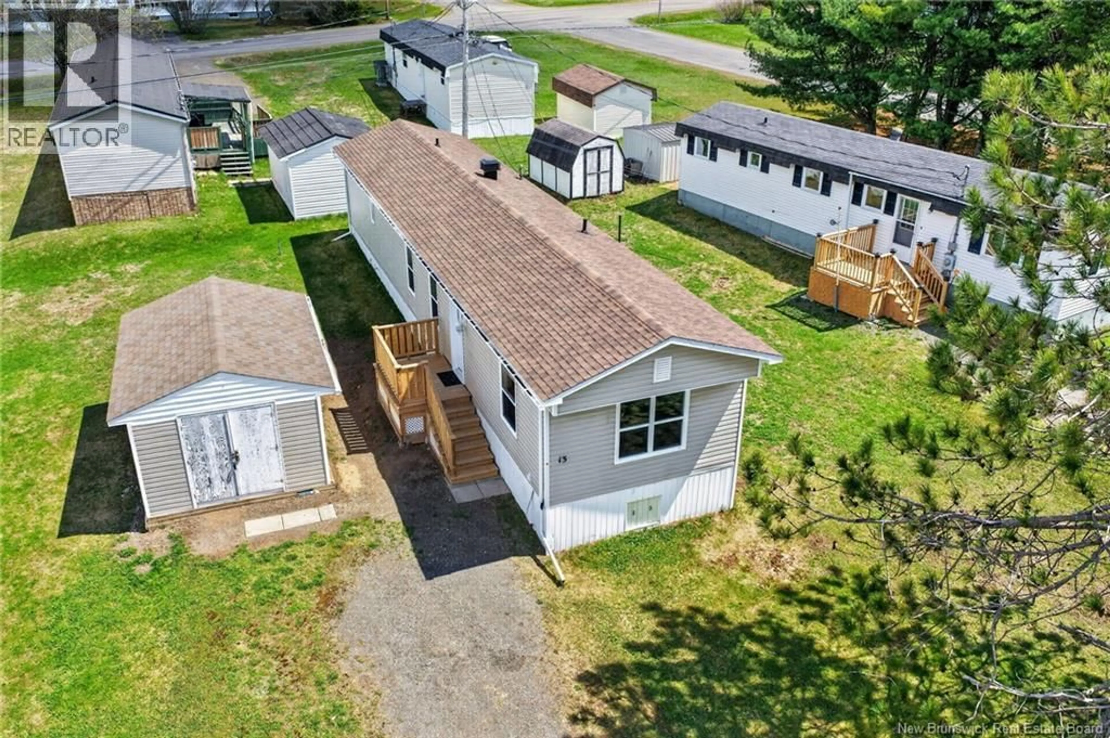 A pic from outside/outdoor area/front of a property/back of a property/a pic from drone, street for 13 RAWORTH AVENUE, Lakeville New Brunswick E1H1C1