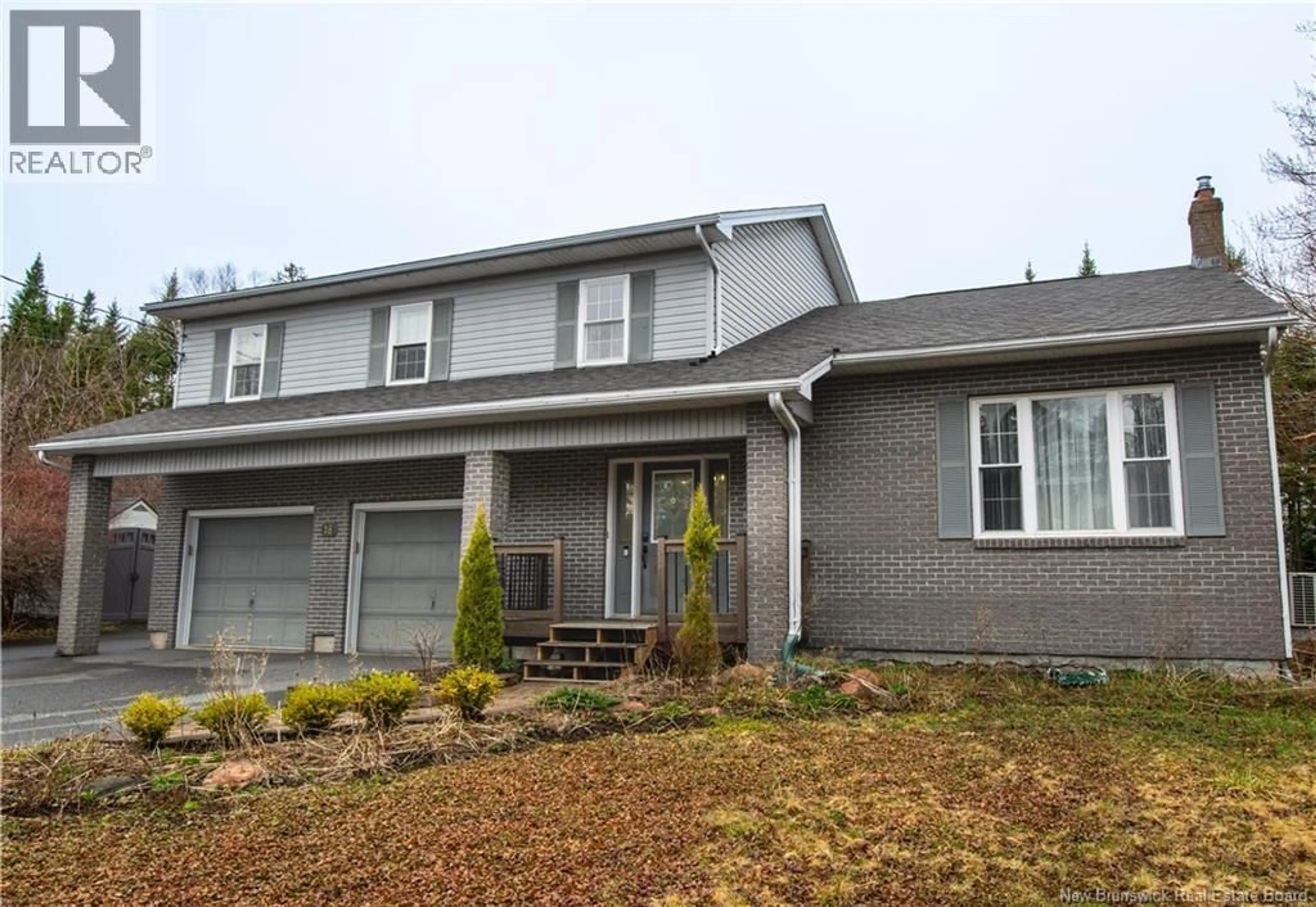 Home with vinyl exterior material, street for 18 COUNTRY CLUB DRIVE, Saint John New Brunswick E5K3B8