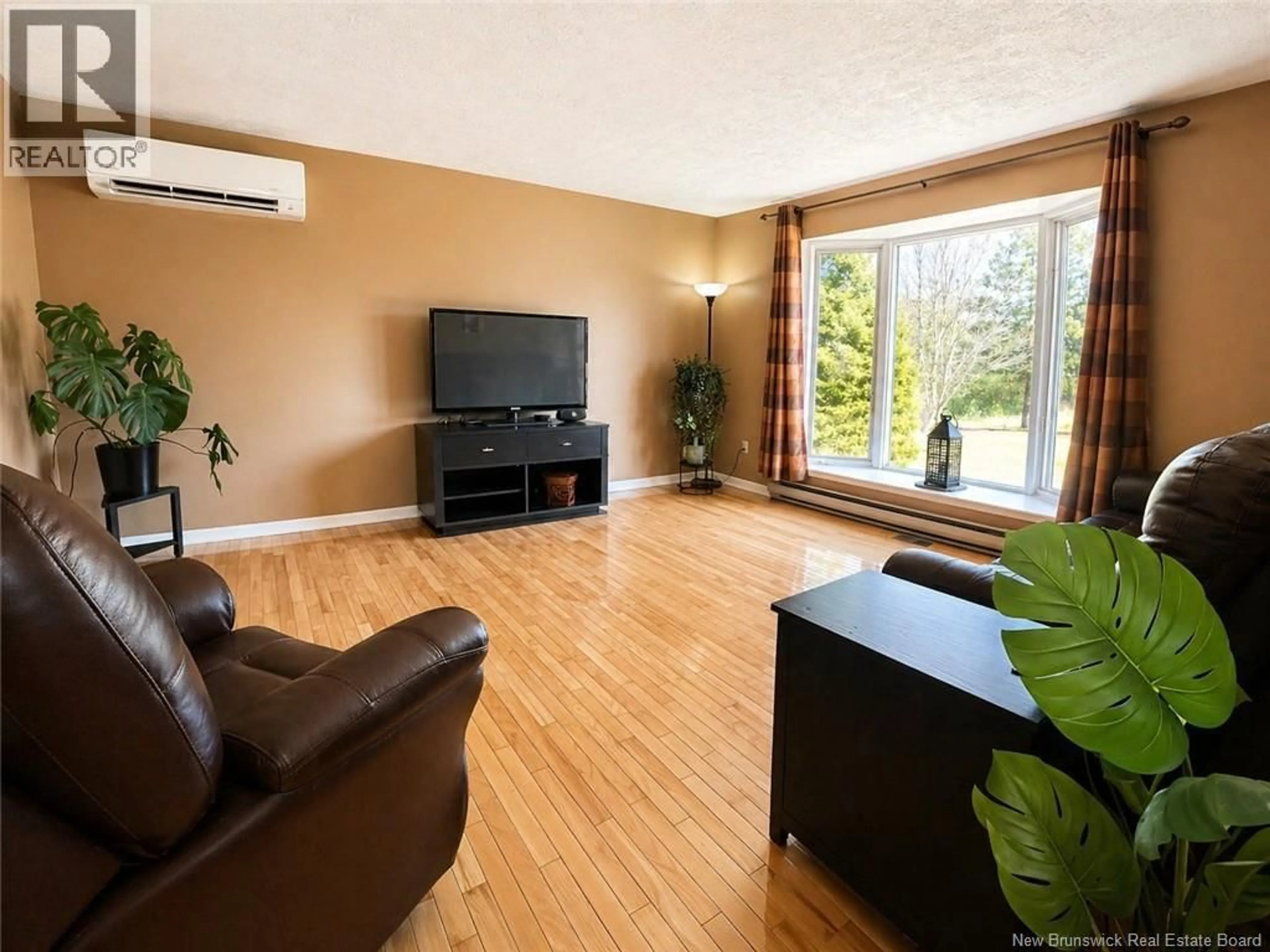 Living room with furniture, wood/laminate floor for 5416 ROUTE 440, Rosaireville New Brunswick E4Y2R6